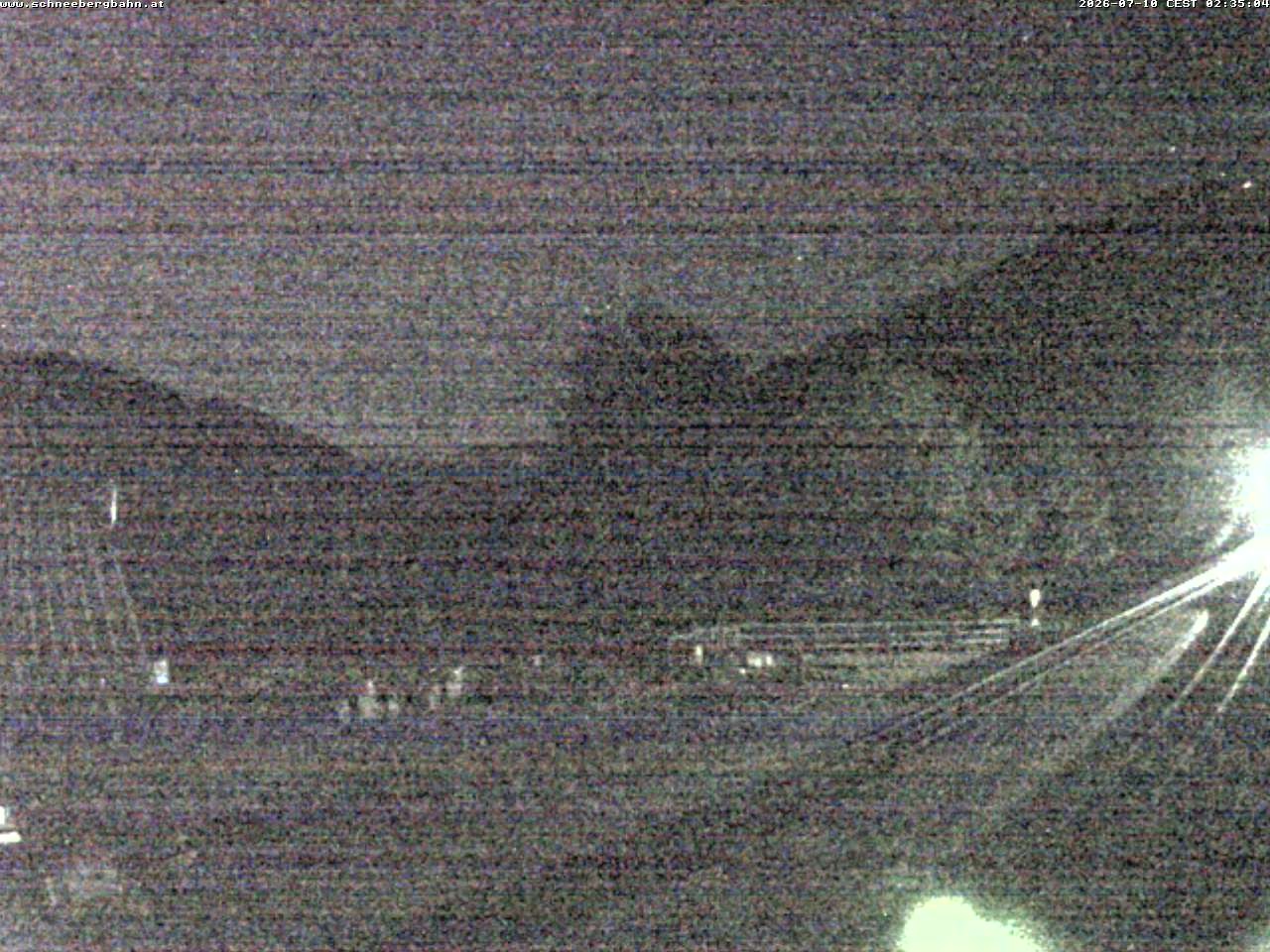 Archived image Webcam Schneeberg: View mountain restaurant Baumgartner