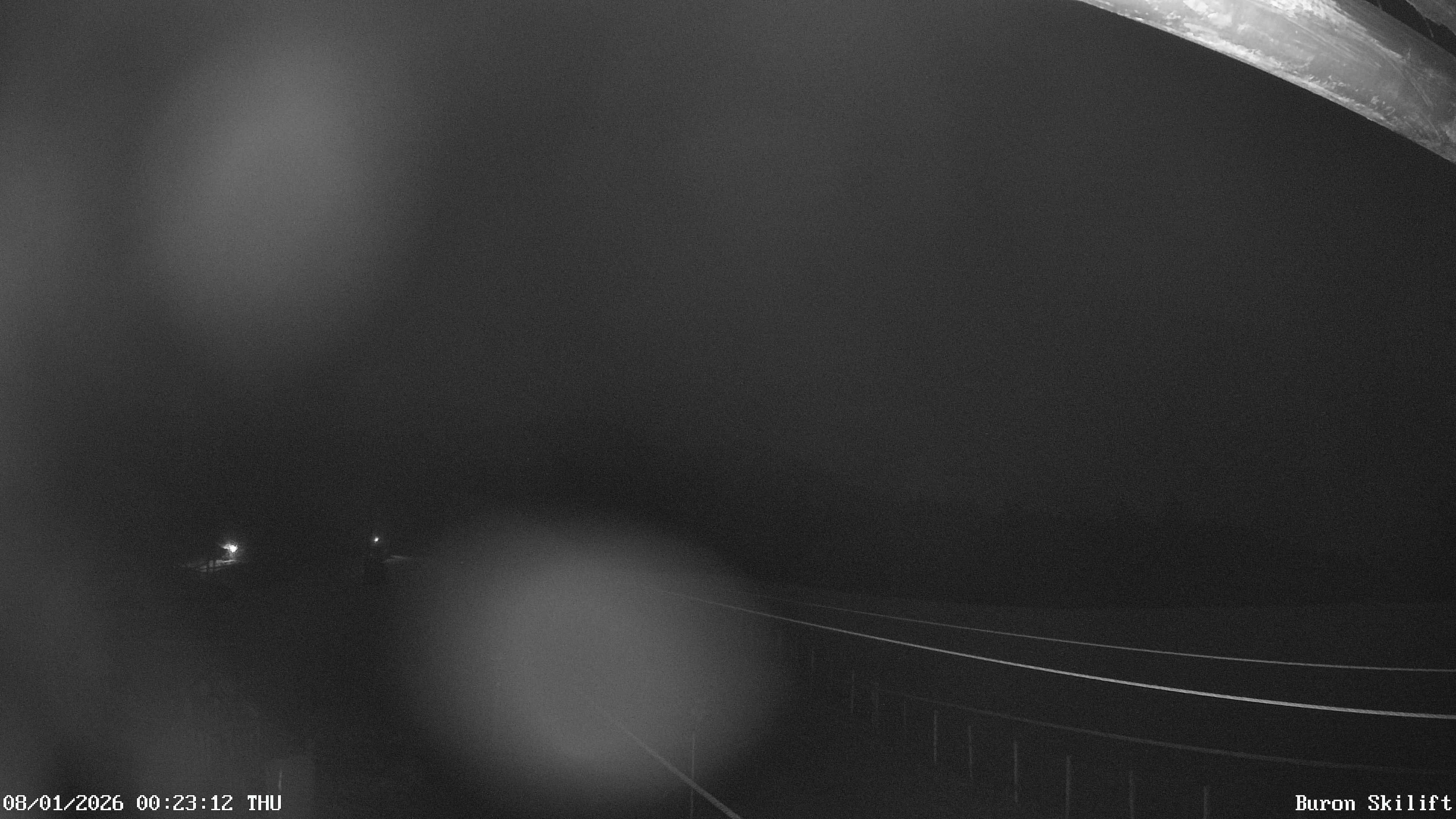 Archiv Foto Webcam Blick von der Talstation des Schlepplifts Buron auf den Lift und die Piste