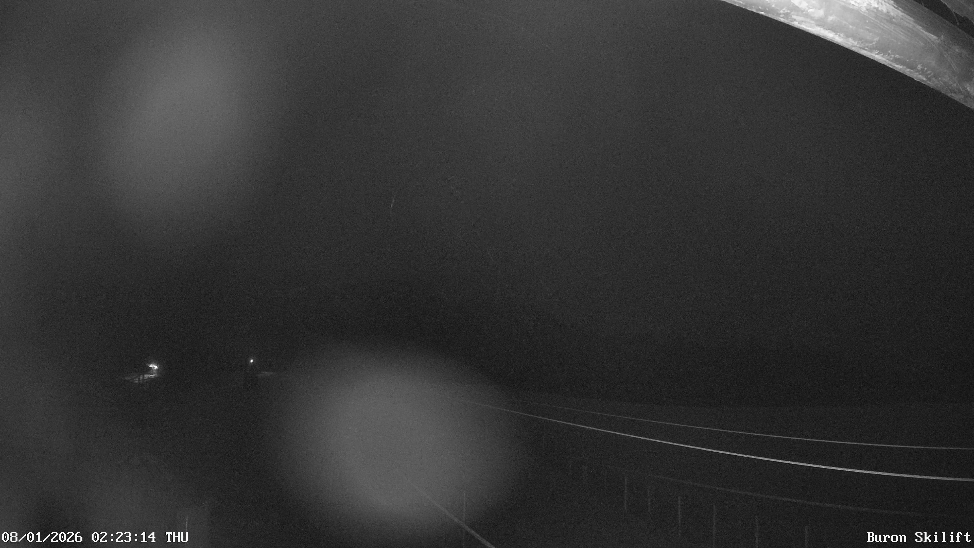 Archiv Foto Webcam Blick von der Talstation des Schlepplifts Buron auf den Lift und die Piste