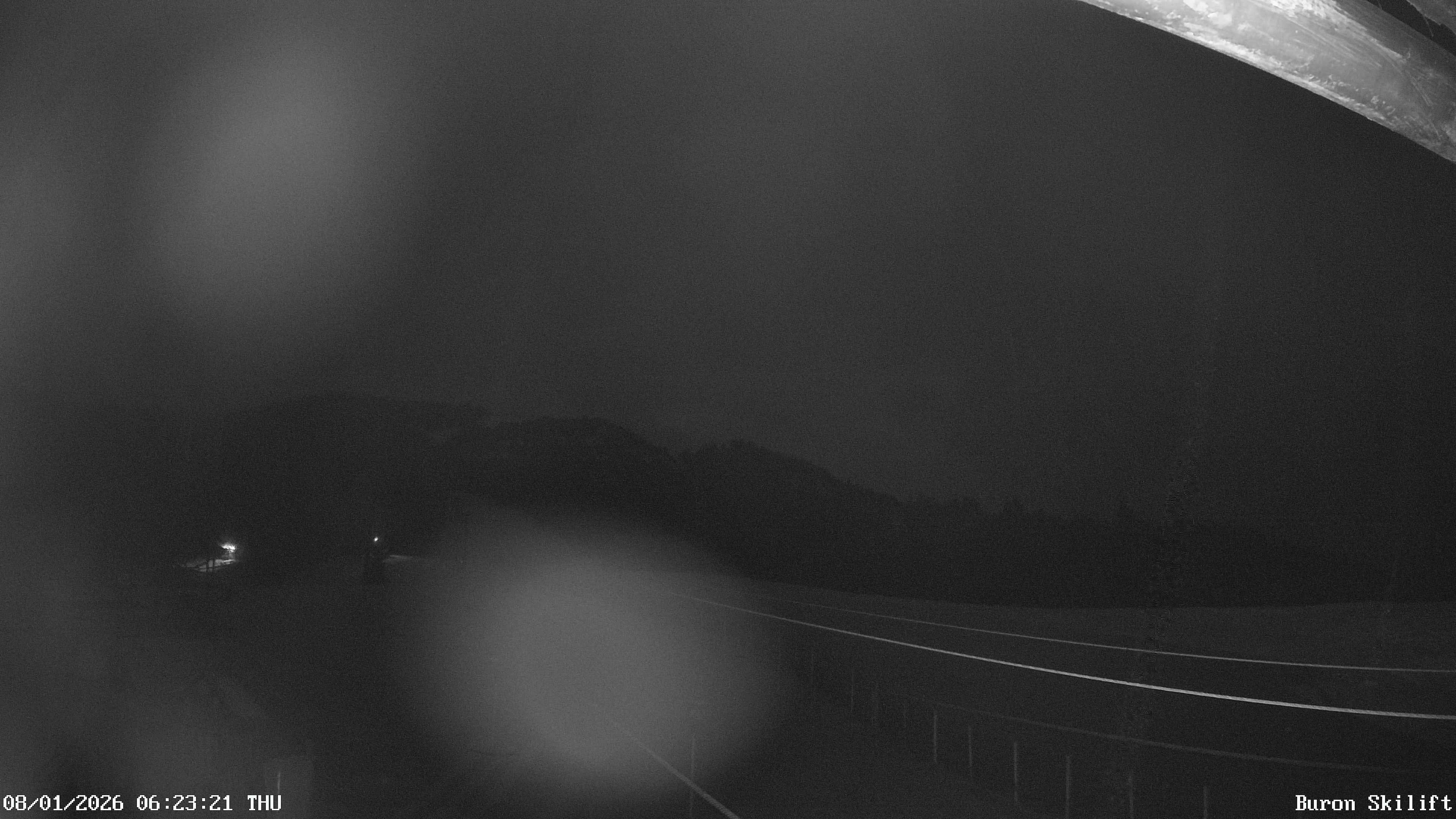 Archiv Foto Webcam Blick von der Talstation des Schlepplifts Buron auf den Lift und die Piste