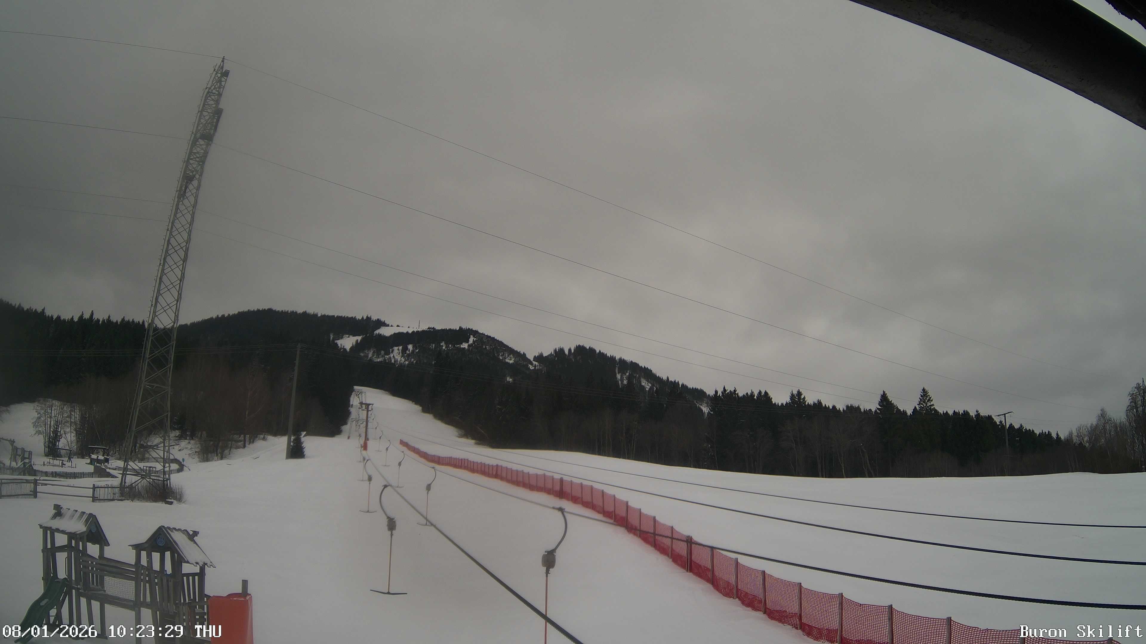 Archiv Foto Webcam Blick von der Talstation des Schlepplifts Buron auf den Lift und die Piste