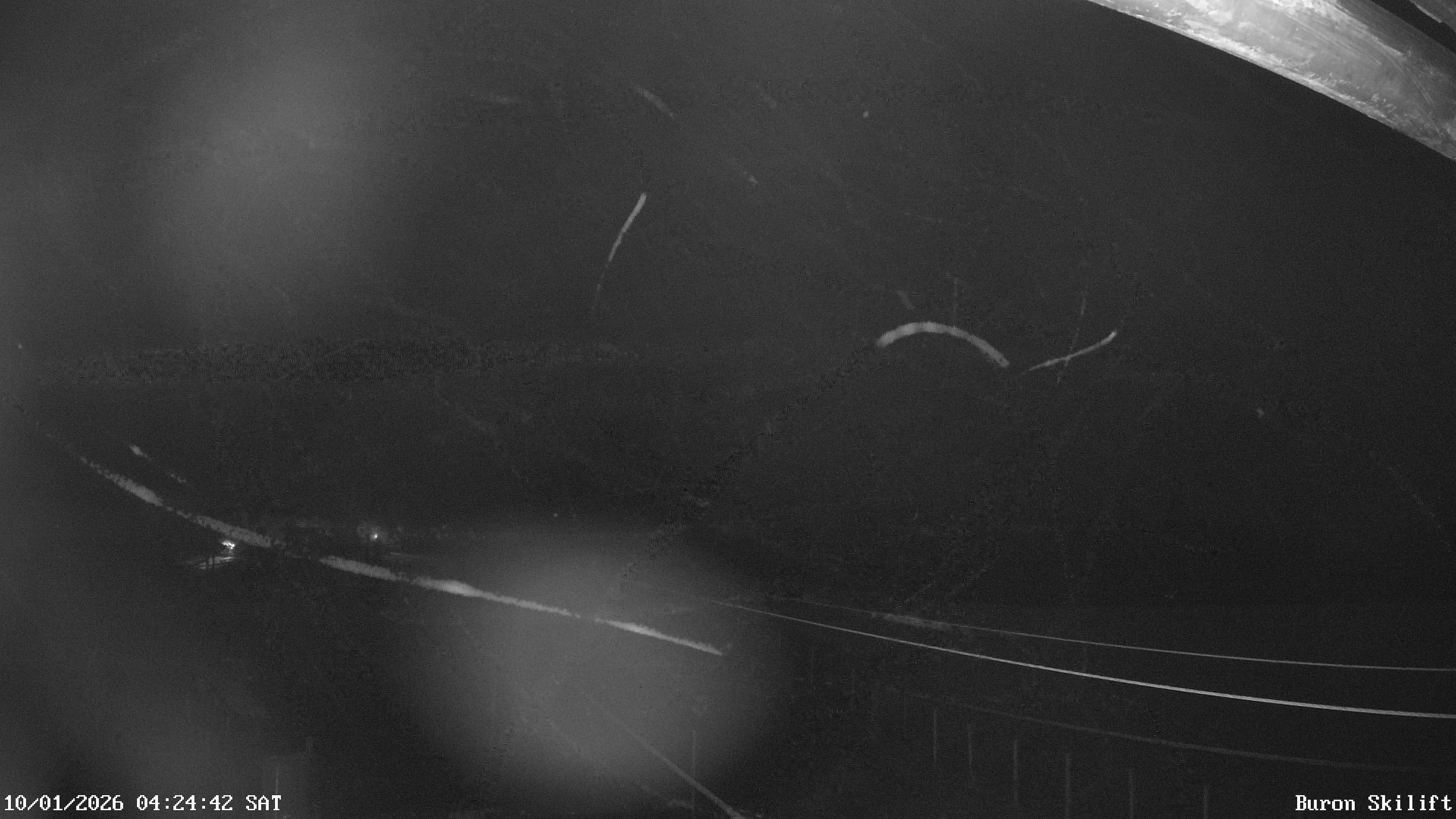 Archiv Foto Webcam Blick von der Talstation des Schlepplifts Buron auf den Lift und die Piste