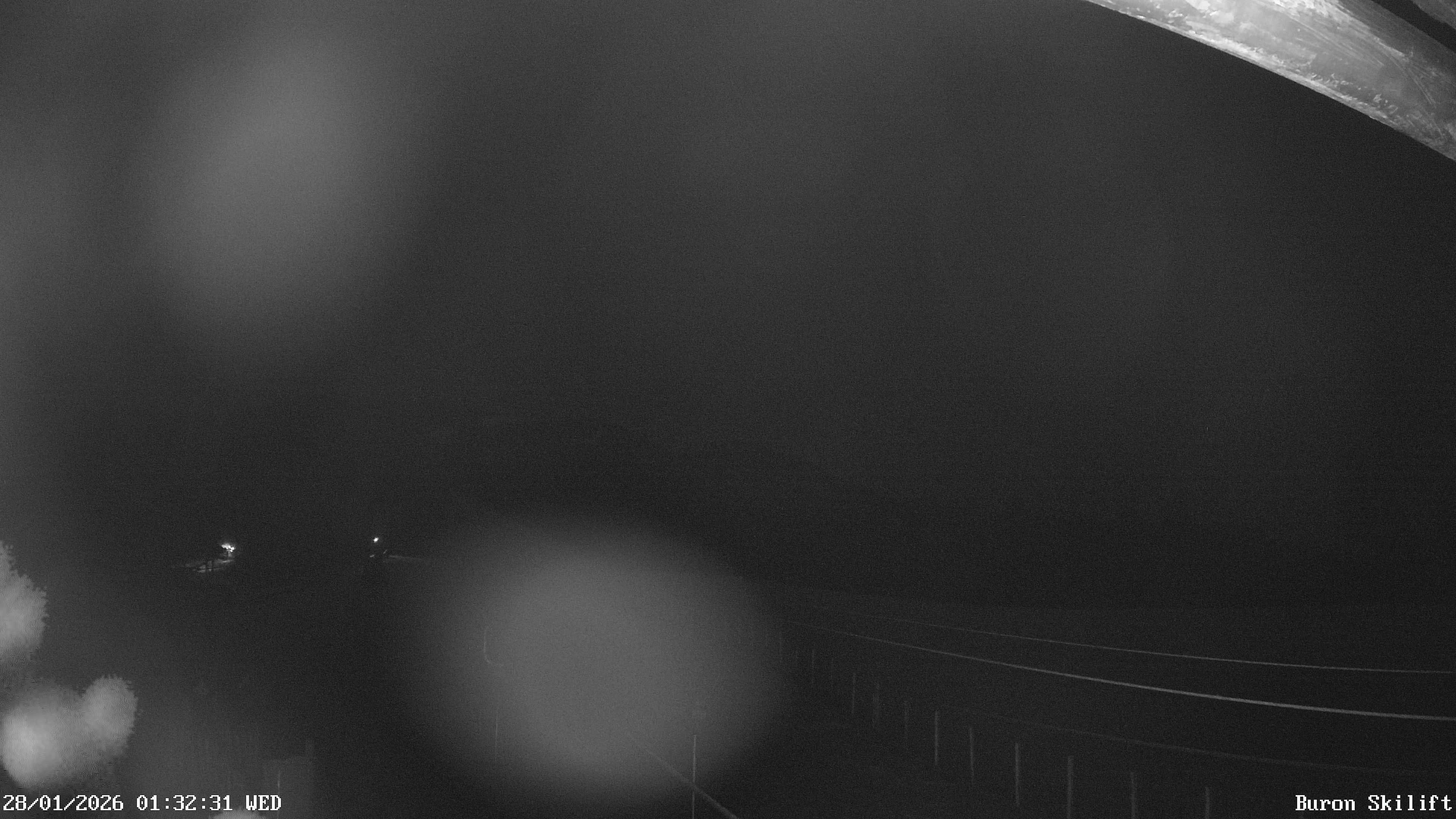 Archiv Foto Webcam Blick von der Talstation des Schlepplifts Buron auf den Lift und die Piste