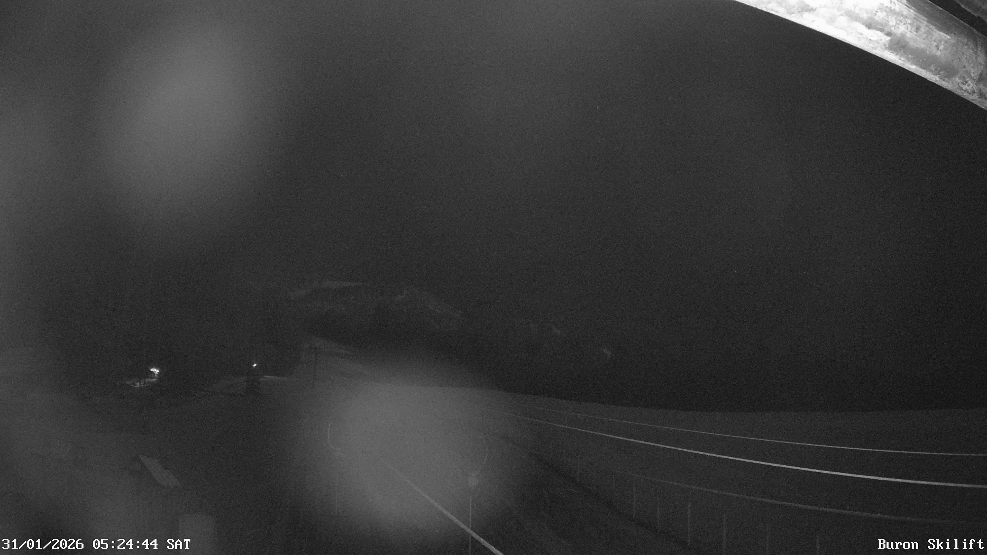 Archiv Foto Webcam Blick von der Talstation des Schlepplifts Buron auf den Lift und die Piste