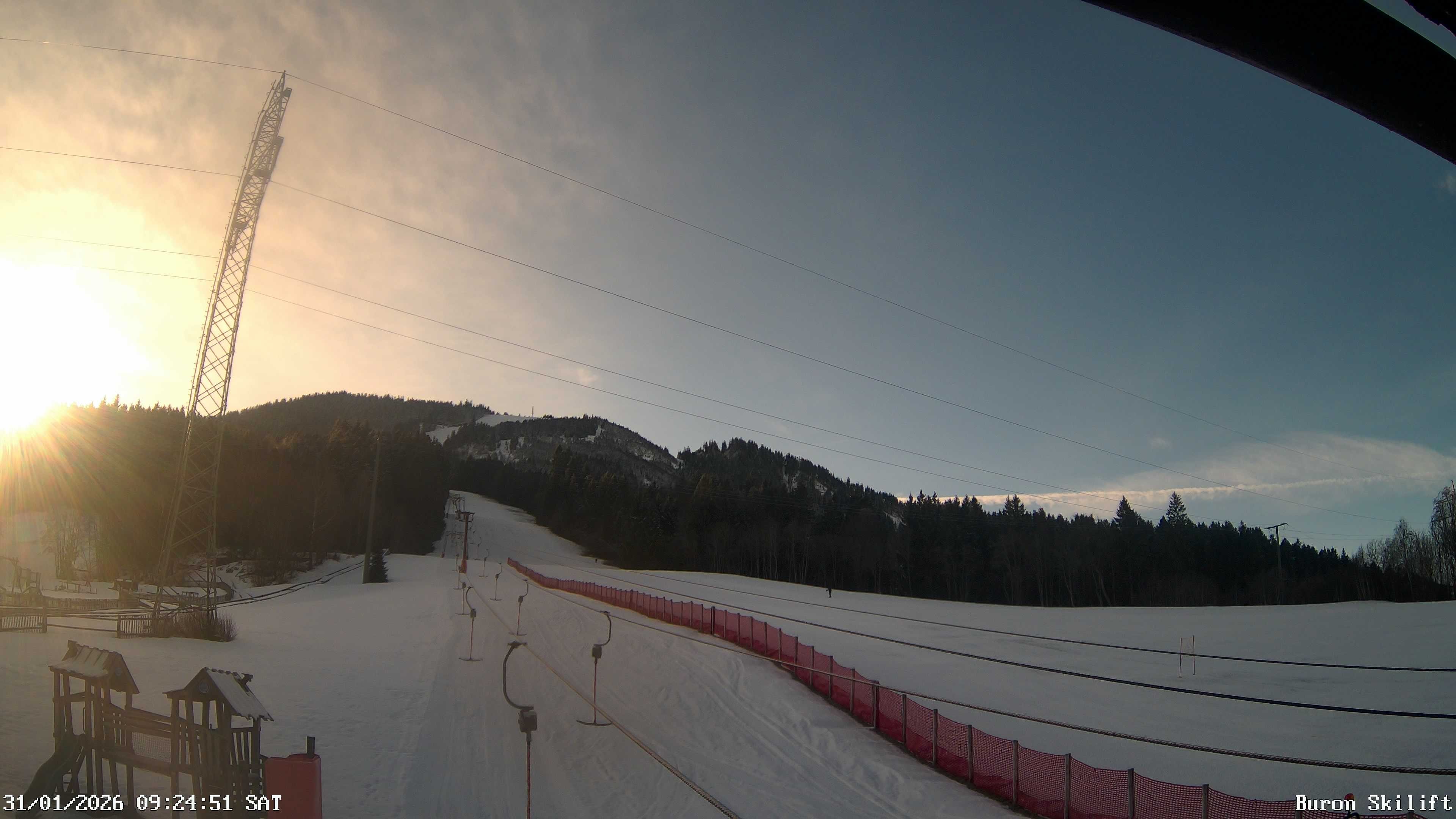 Archiv Foto Webcam Blick von der Talstation des Schlepplifts Buron auf den Lift und die Piste