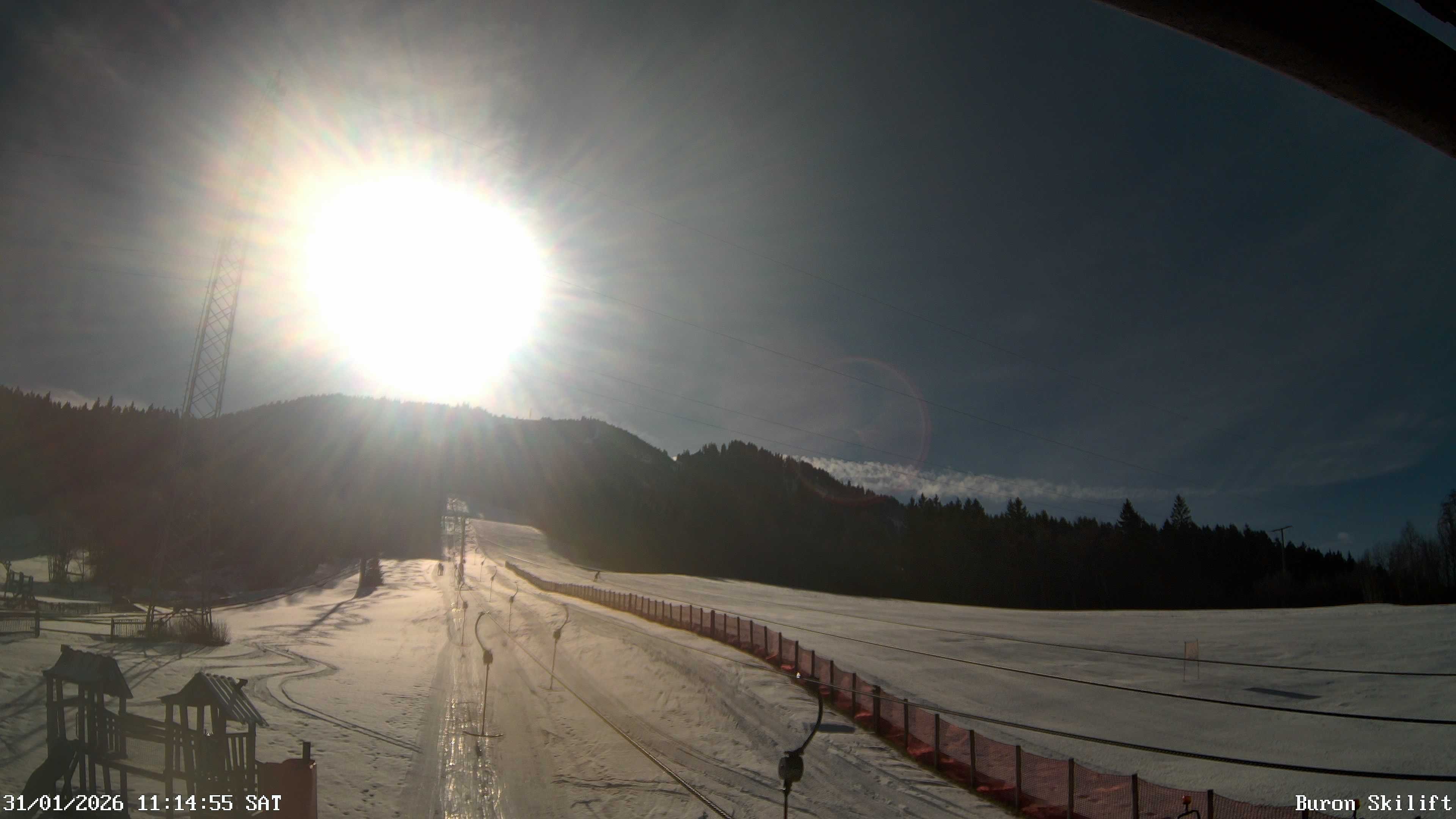 Archiv Foto Webcam Blick von der Talstation des Schlepplifts Buron auf den Lift und die Piste