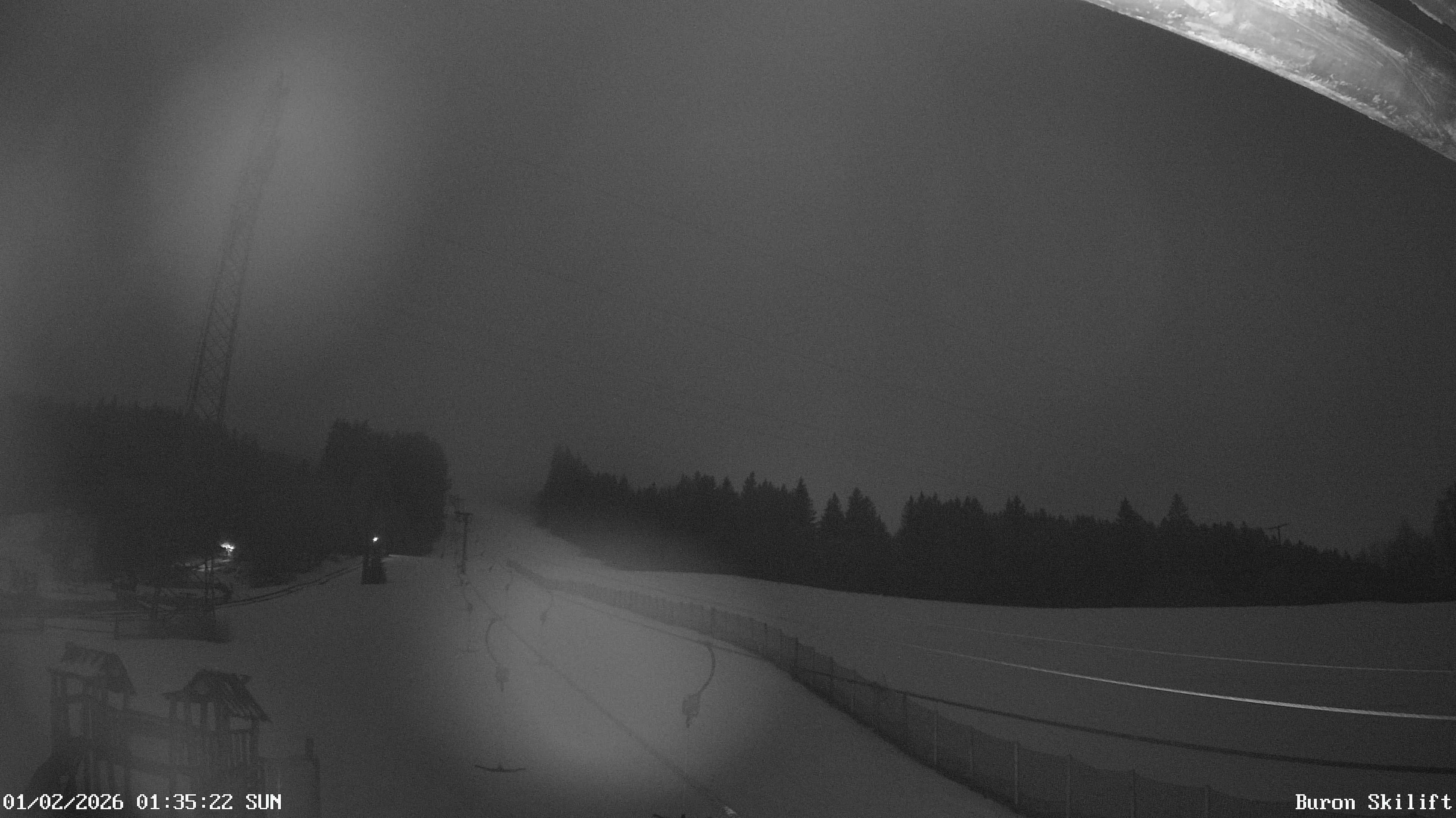 Archiv Foto Webcam Blick von der Talstation des Schlepplifts Buron auf den Lift und die Piste