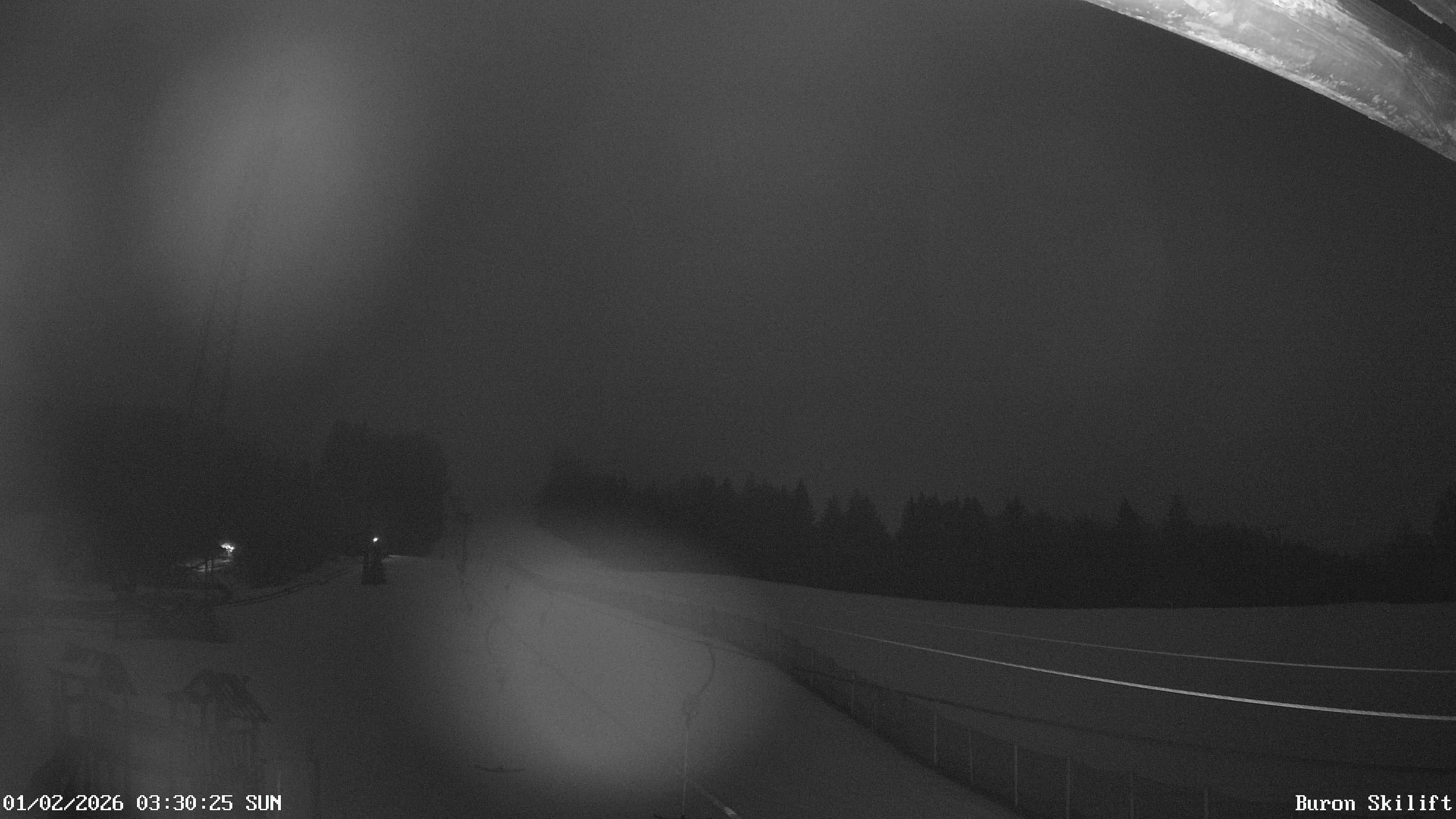 Archiv Foto Webcam Blick von der Talstation des Schlepplifts Buron auf den Lift und die Piste