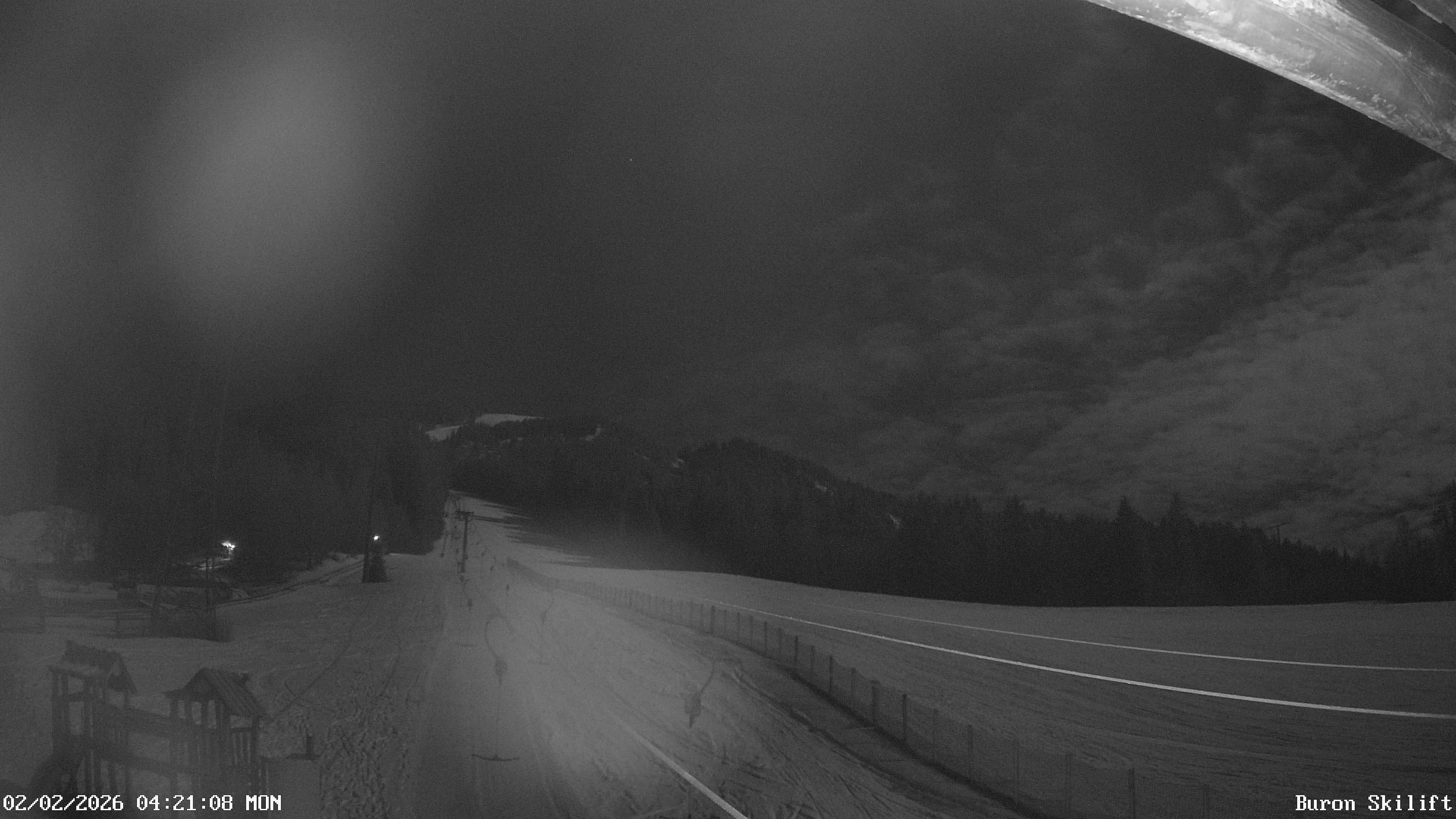 Archiv Foto Webcam Blick von der Talstation des Schlepplifts Buron auf den Lift und die Piste