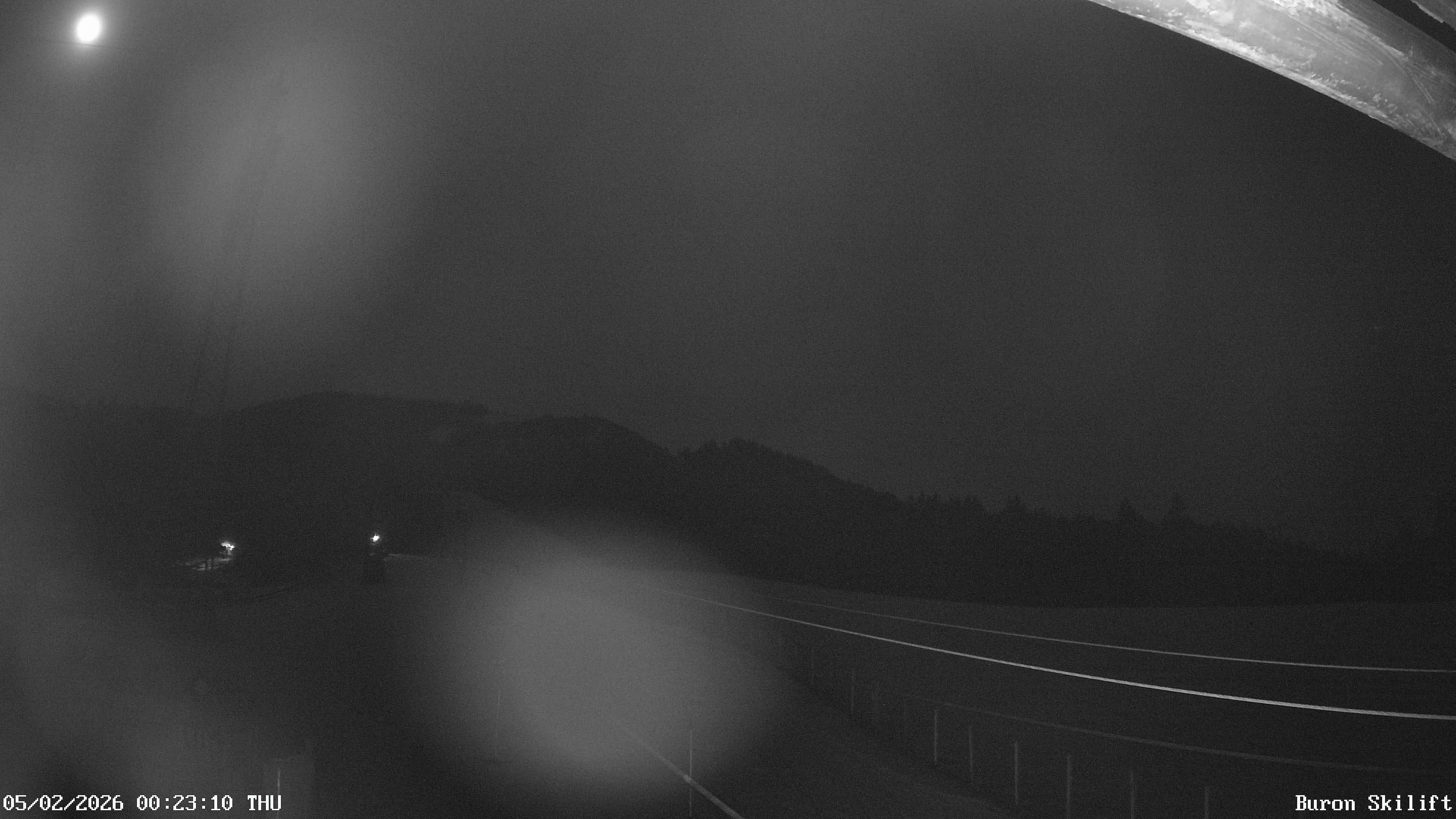 Archiv Foto Webcam Blick von der Talstation des Schlepplifts Buron auf den Lift und die Piste