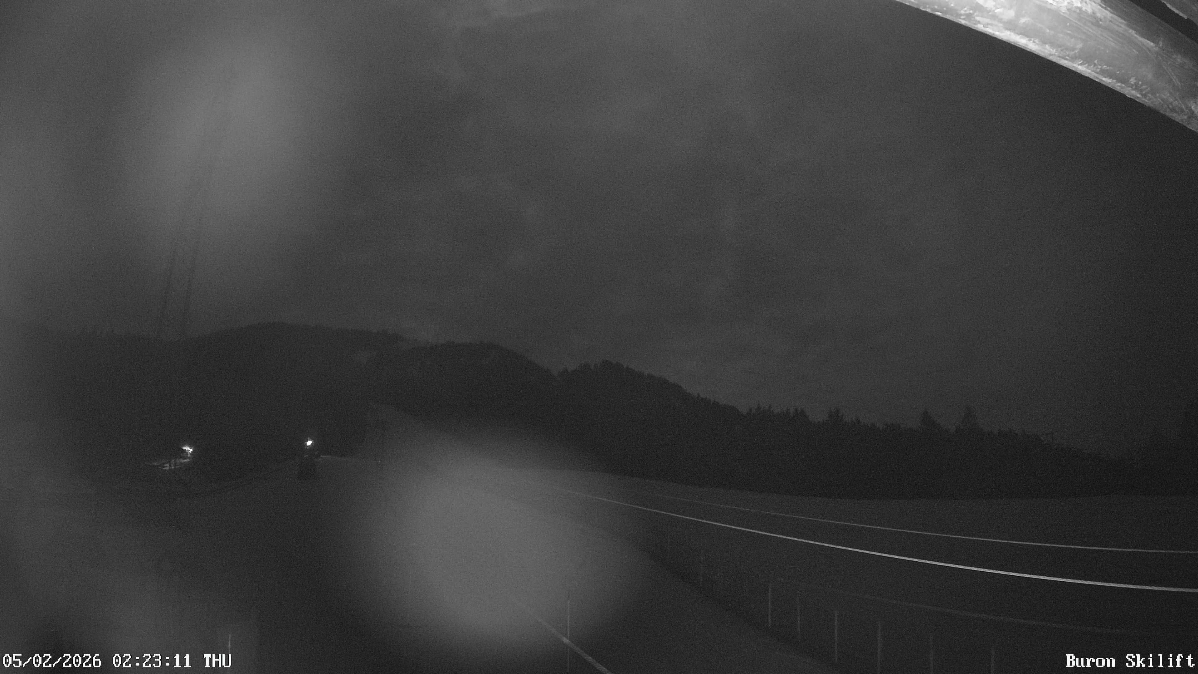 Archiv Foto Webcam Blick von der Talstation des Schlepplifts Buron auf den Lift und die Piste