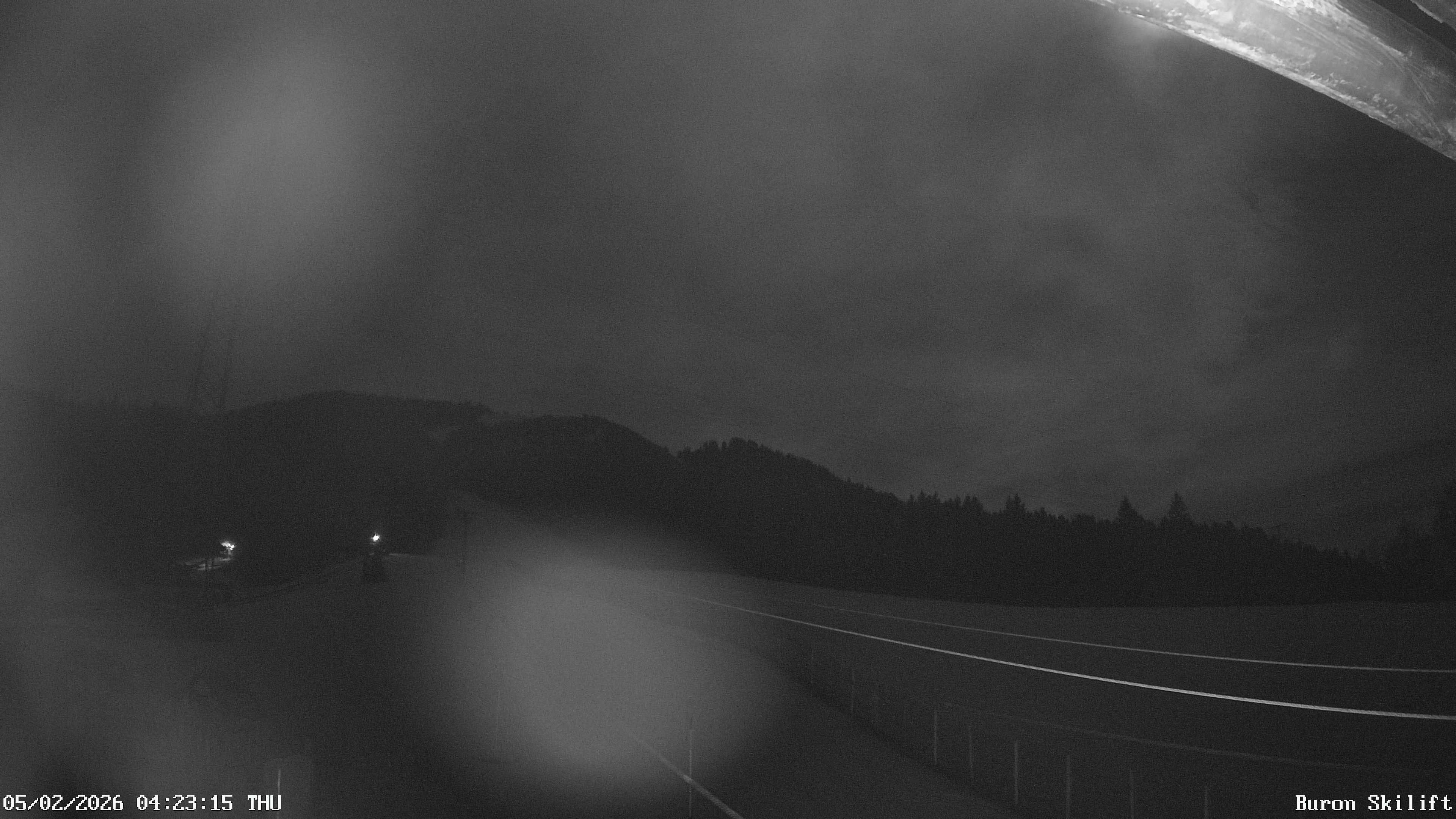 Archiv Foto Webcam Blick von der Talstation des Schlepplifts Buron auf den Lift und die Piste