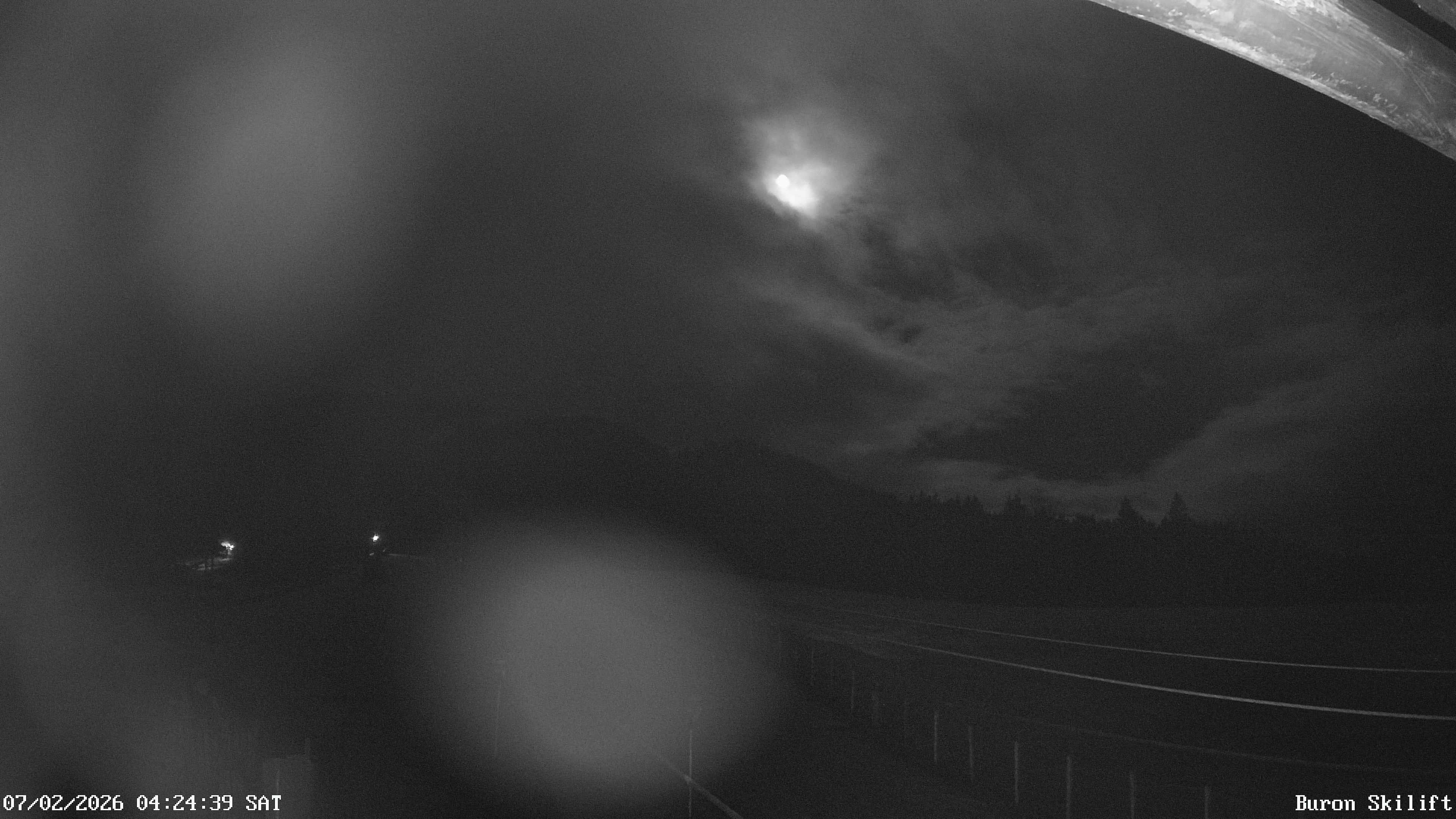 Archiv Foto Webcam Blick von der Talstation des Schlepplifts Buron auf den Lift und die Piste