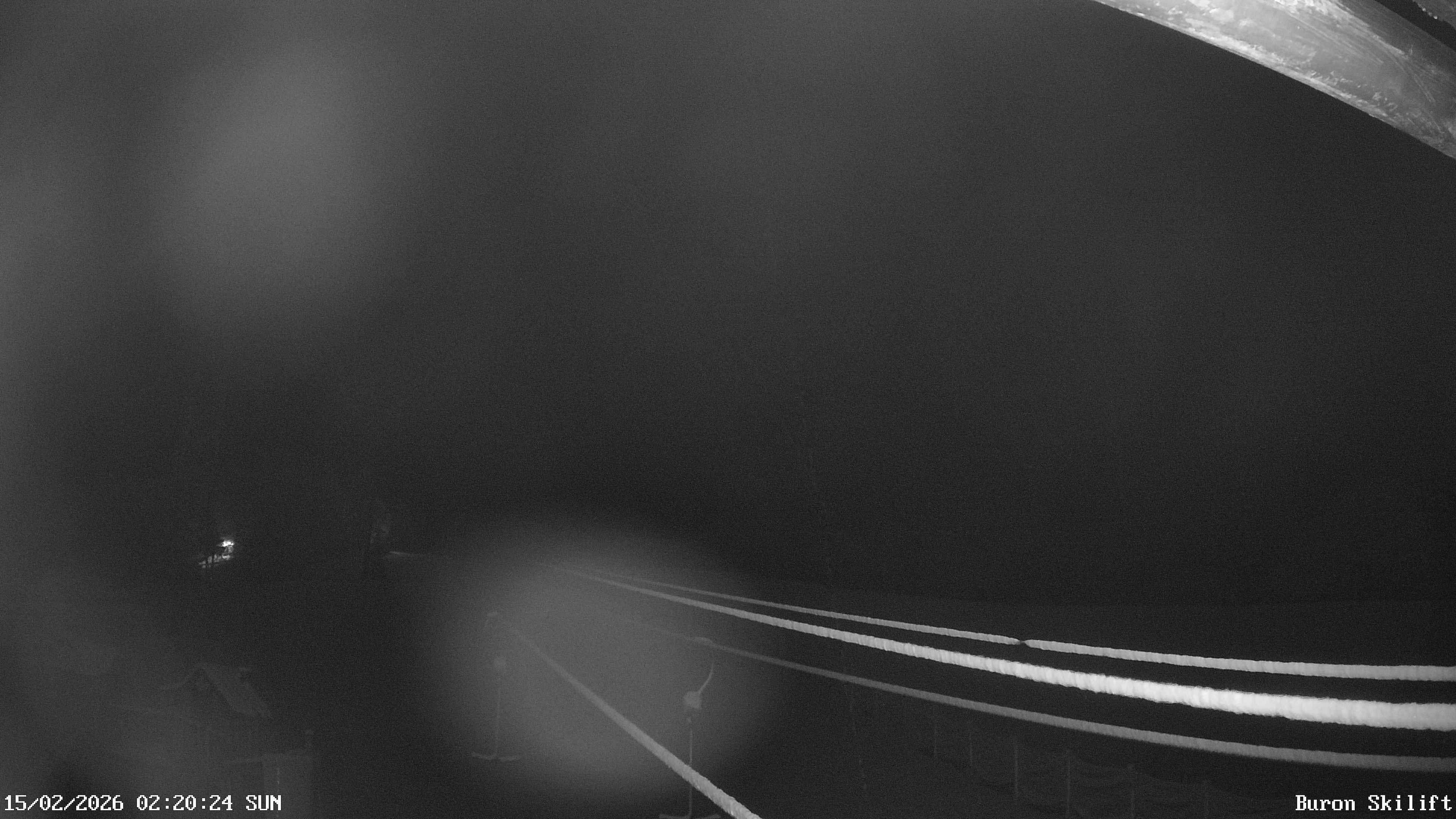 Archiv Foto Webcam Blick von der Talstation des Schlepplifts Buron auf den Lift und die Piste