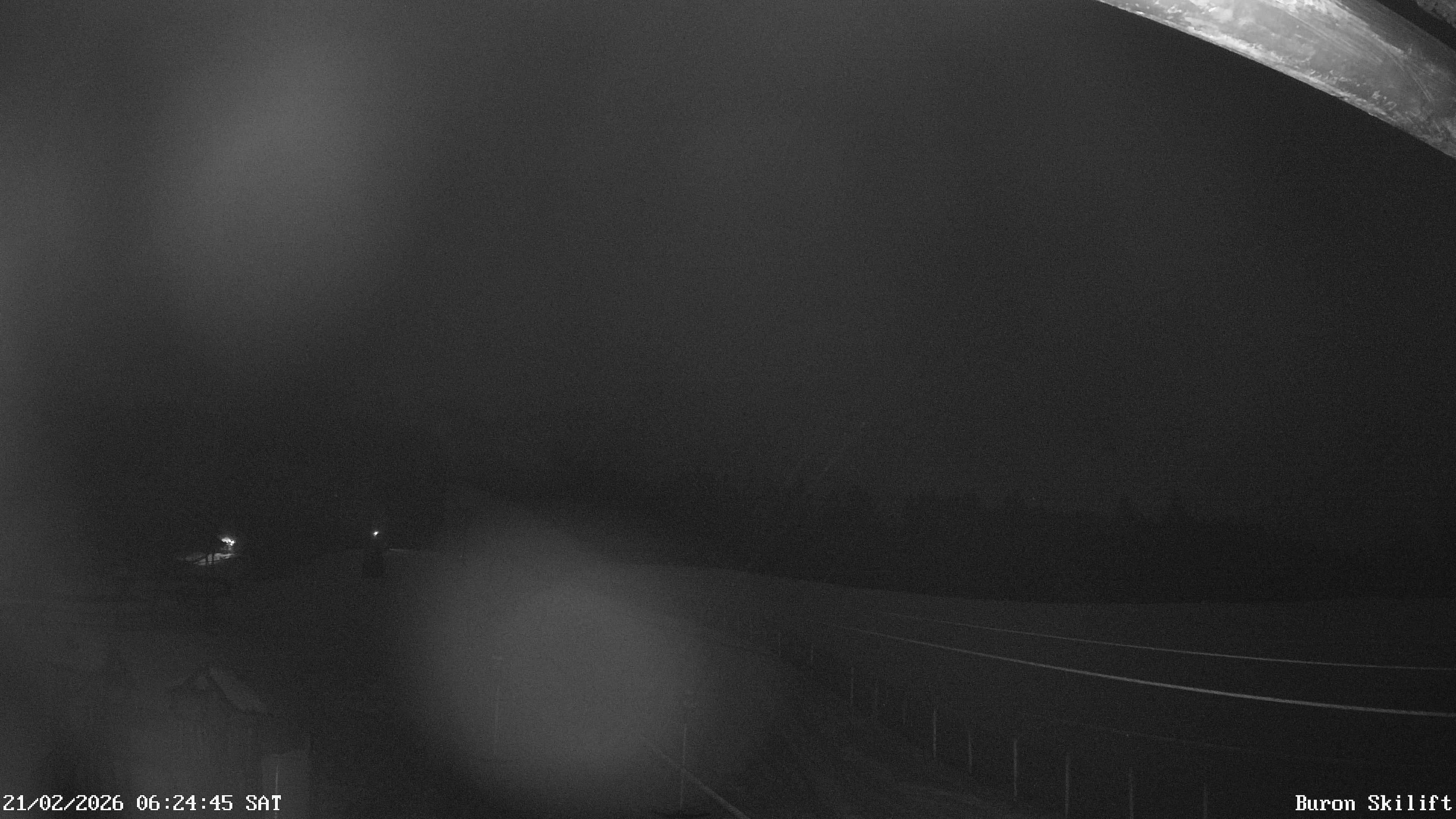 Archiv Foto Webcam Blick von der Talstation des Schlepplifts Buron auf den Lift und die Piste