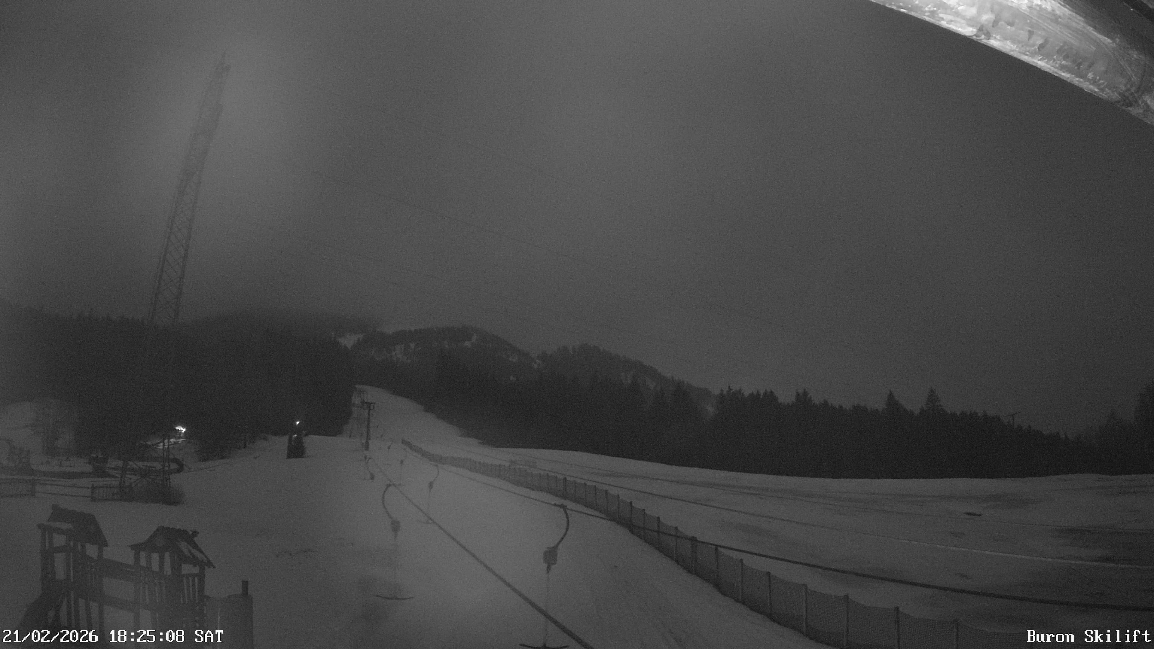 Archiv Foto Webcam Blick von der Talstation des Schlepplifts Buron auf den Lift und die Piste