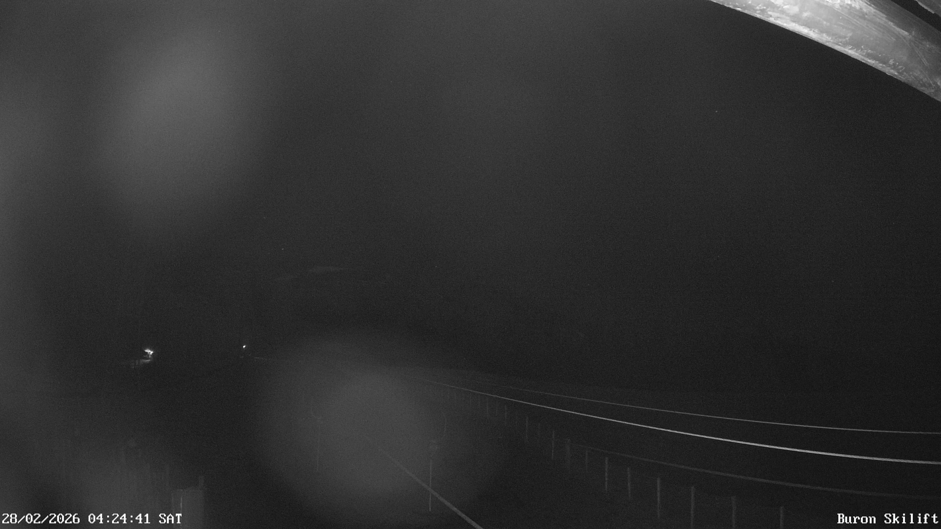 Archiv Foto Webcam Blick von der Talstation des Schlepplifts Buron auf den Lift und die Piste