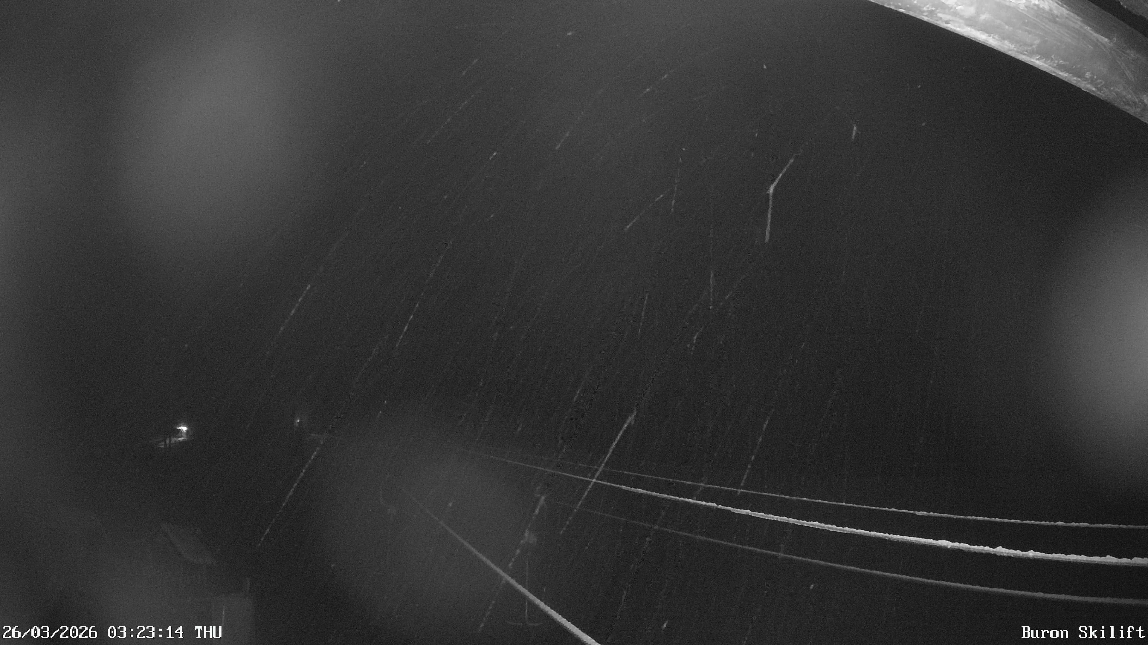 Archiv Foto Webcam Blick von der Talstation des Schlepplifts Buron auf den Lift und die Piste