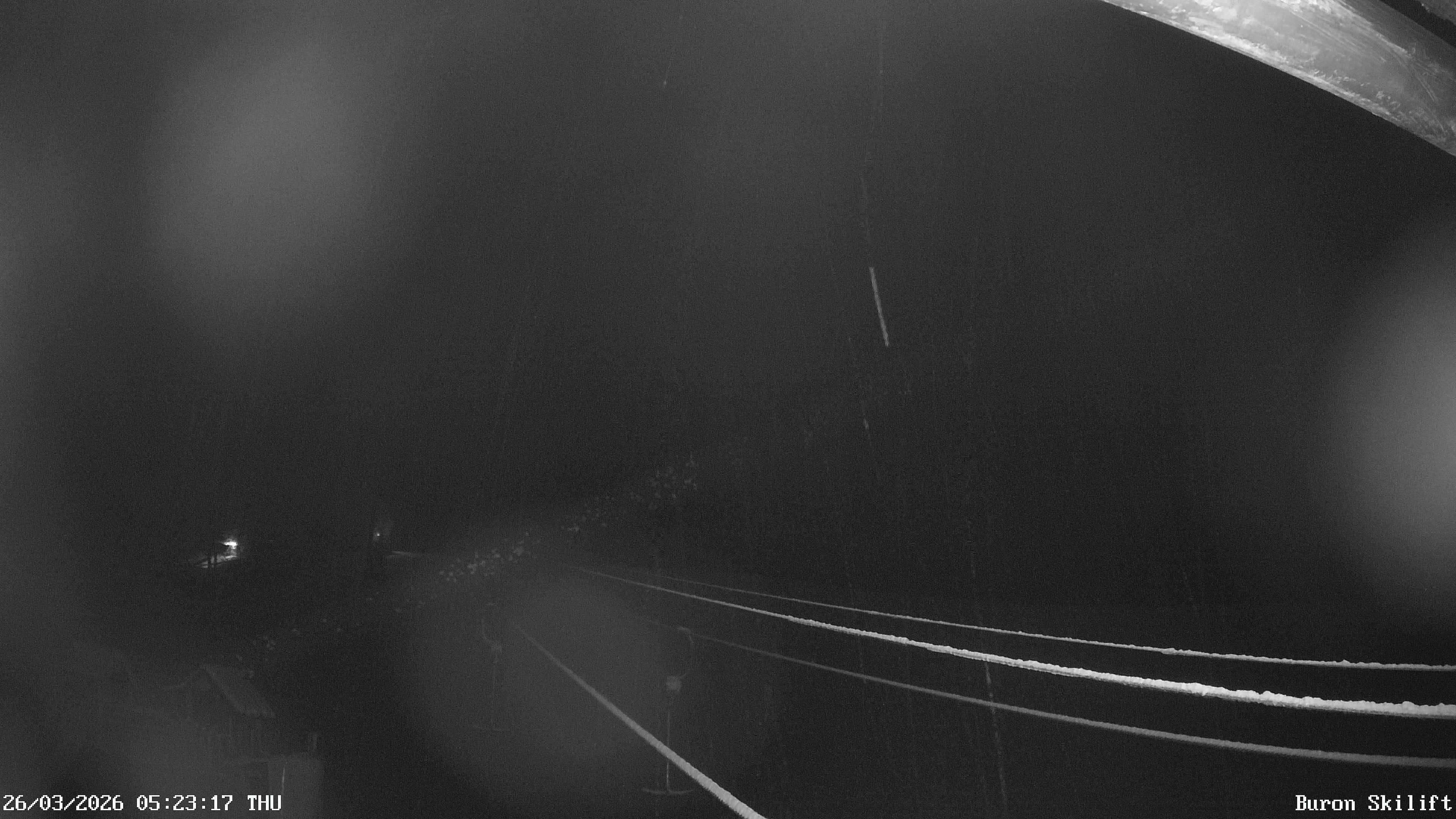 Archiv Foto Webcam Blick von der Talstation des Schlepplifts Buron auf den Lift und die Piste