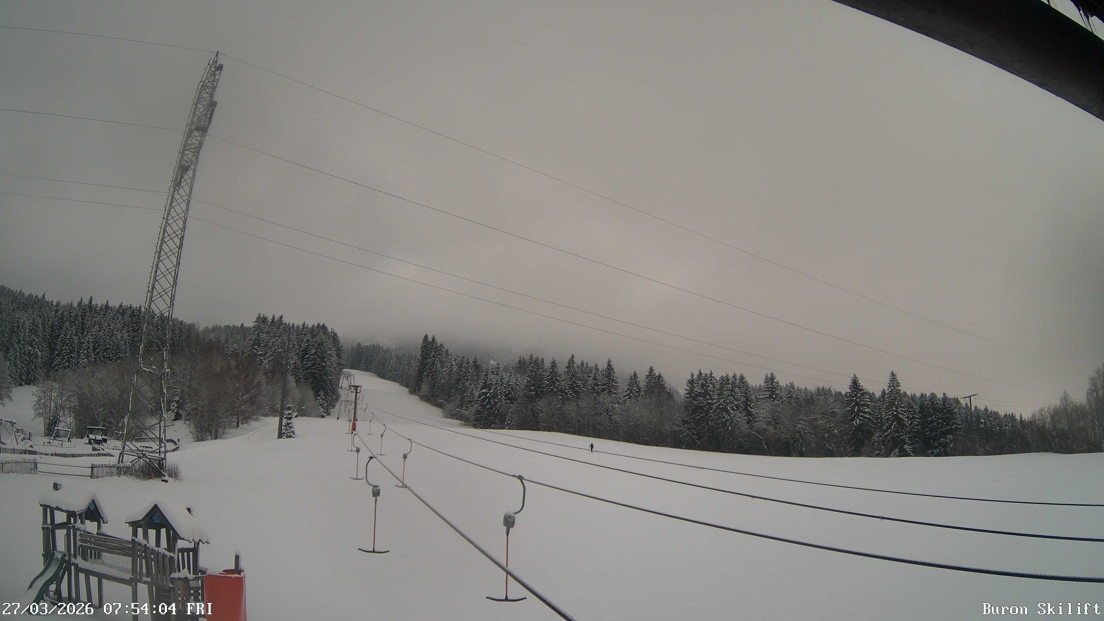 Archiv Foto Webcam Blick von der Talstation des Schlepplifts Buron auf den Lift und die Piste