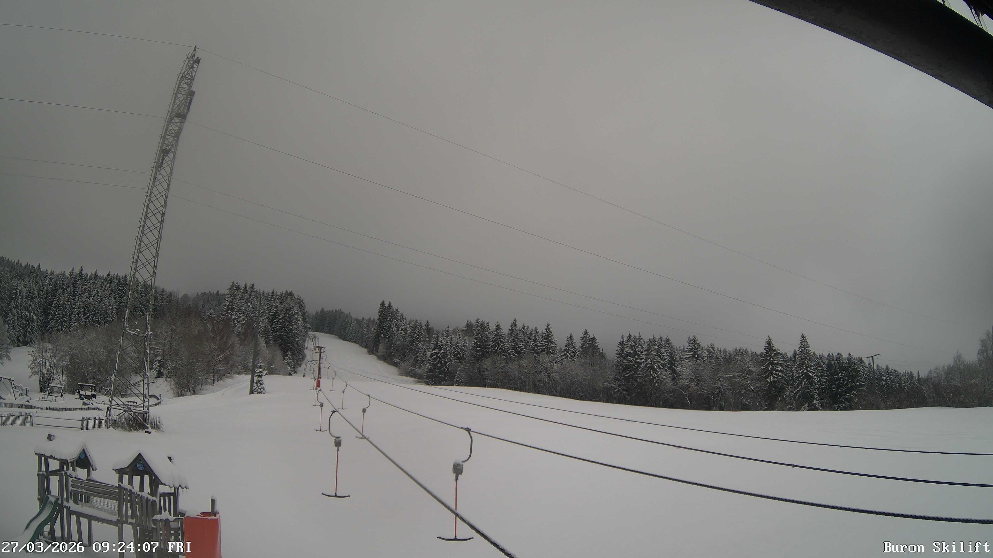 Archiv Foto Webcam Blick von der Talstation des Schlepplifts Buron auf den Lift und die Piste