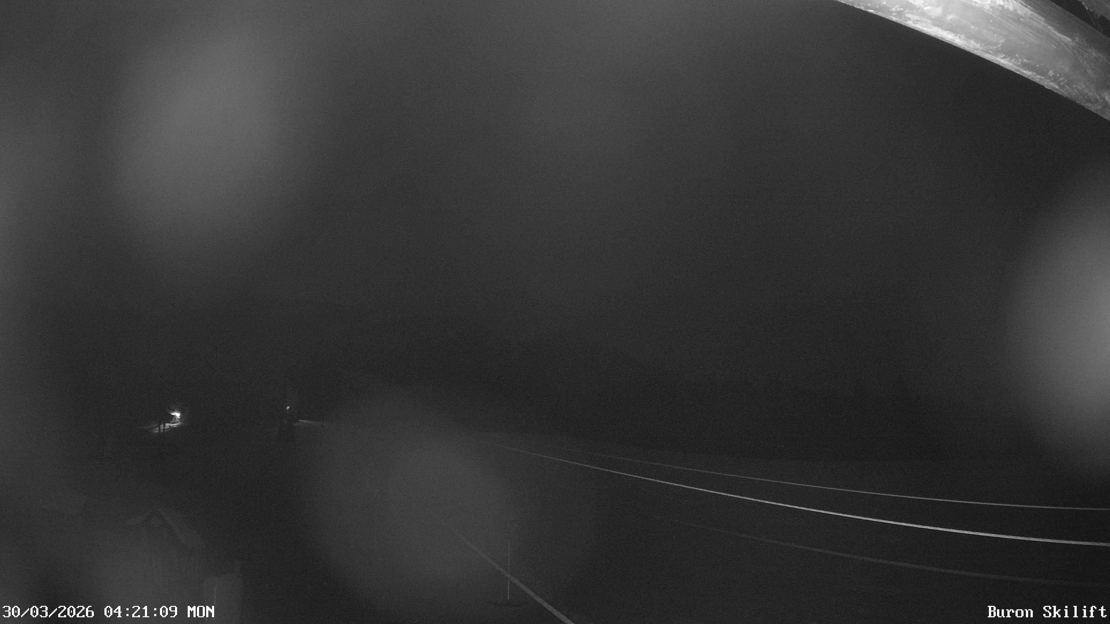 Archiv Foto Webcam Blick von der Talstation des Schlepplifts Buron auf den Lift und die Piste