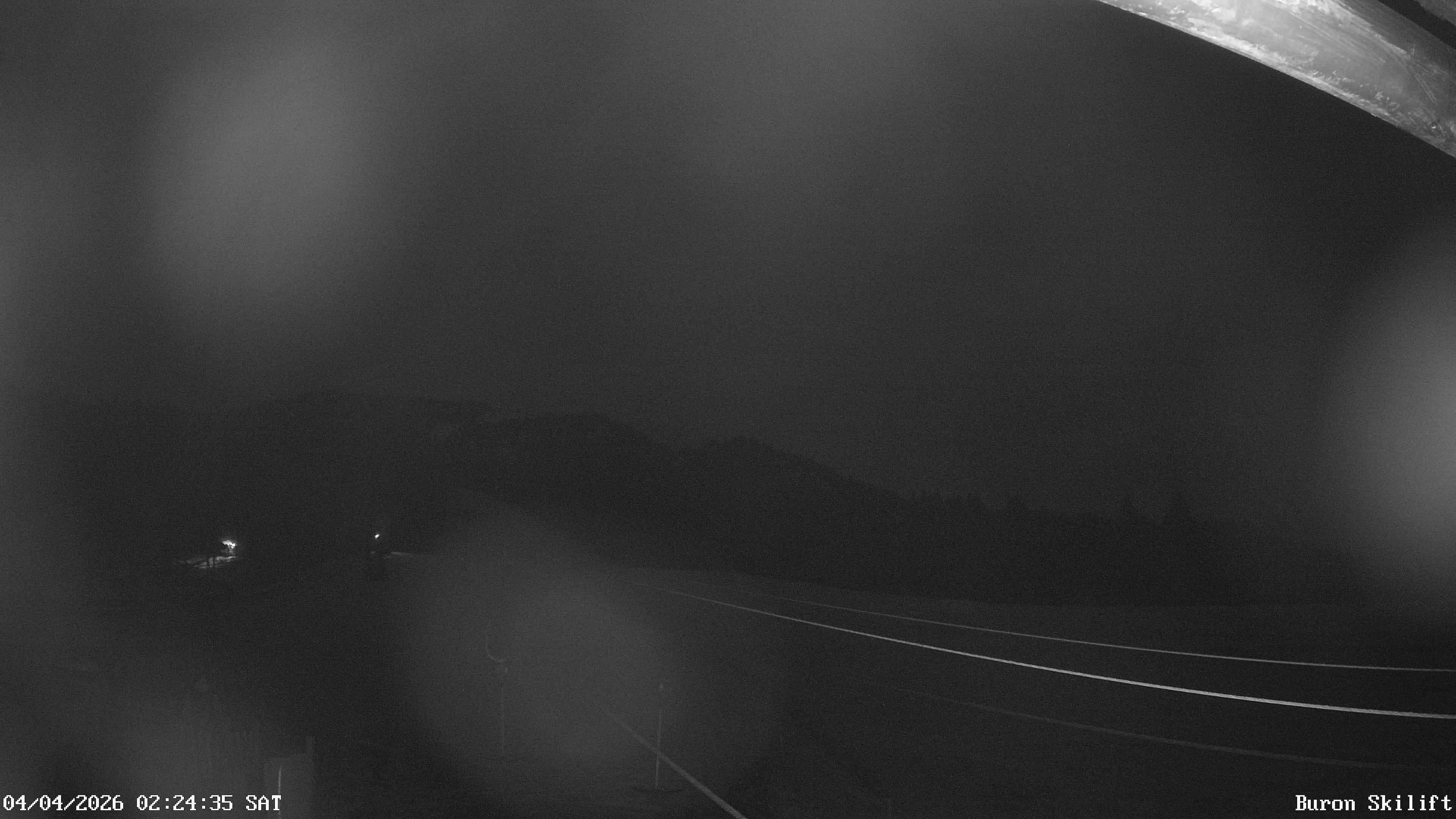 Archiv Foto Webcam Blick von der Talstation des Schlepplifts Buron auf den Lift und die Piste