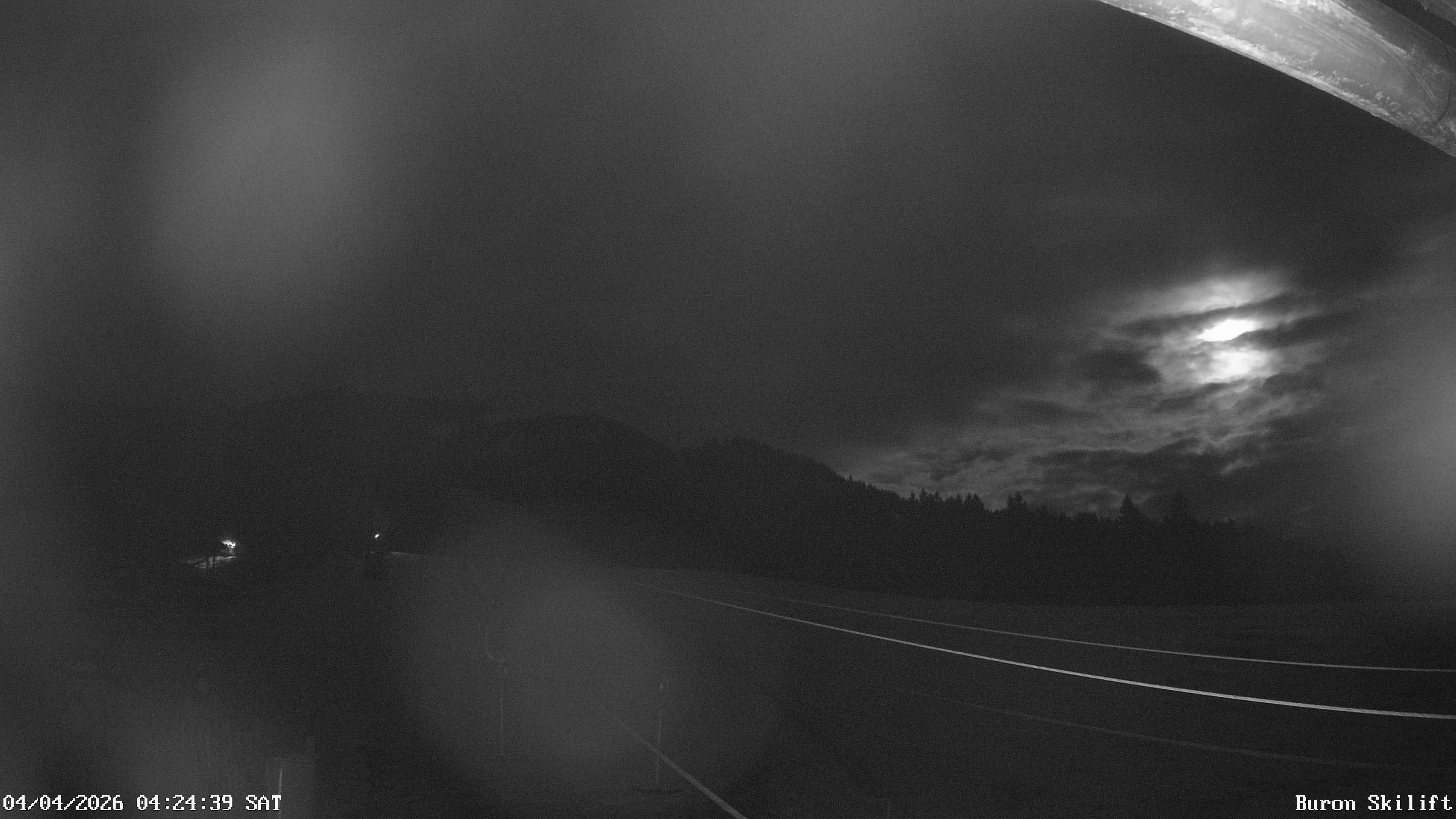 Archiv Foto Webcam Blick von der Talstation des Schlepplifts Buron auf den Lift und die Piste