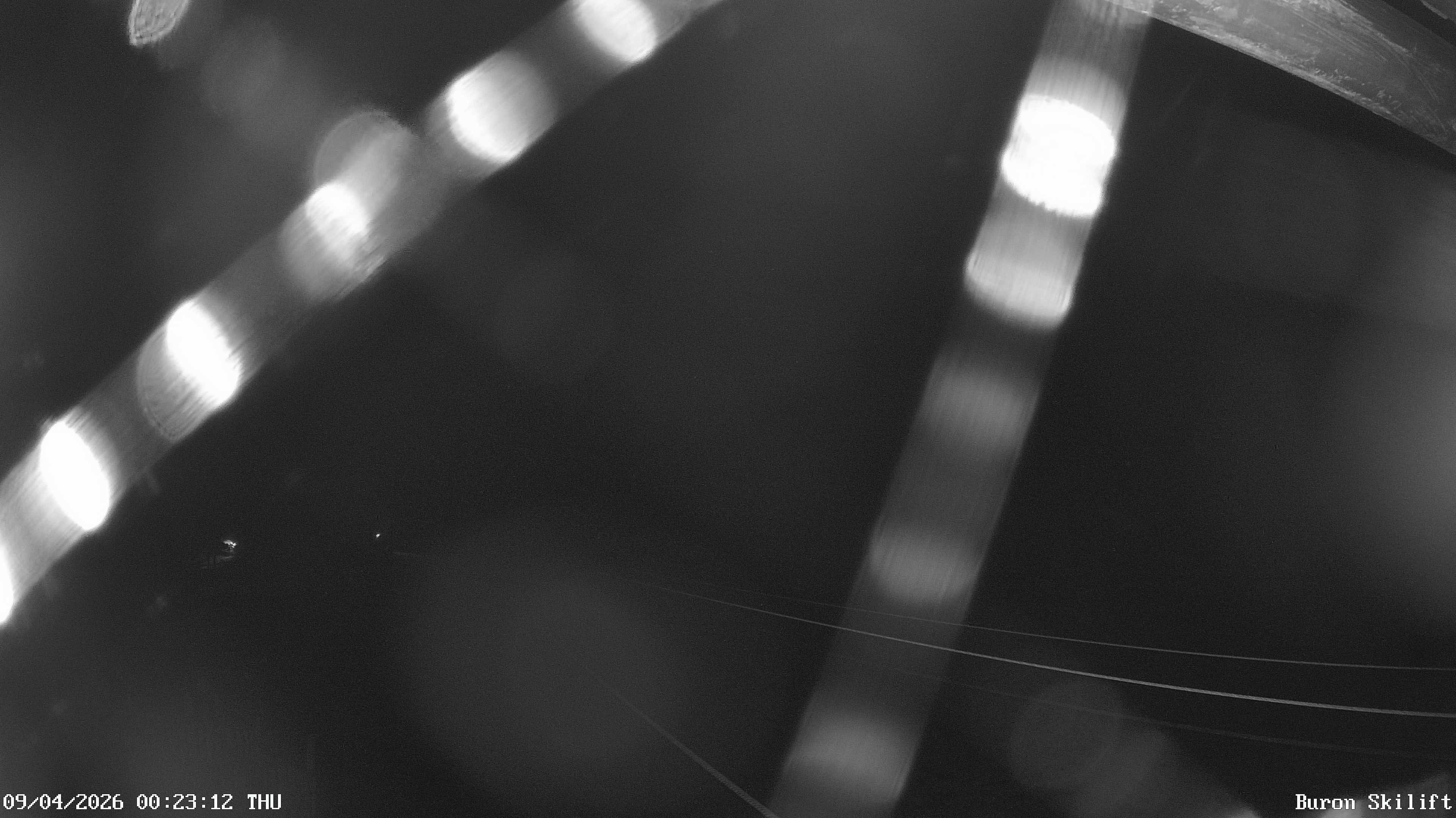 Archiv Foto Webcam Blick von der Talstation des Schlepplifts Buron auf den Lift und die Piste