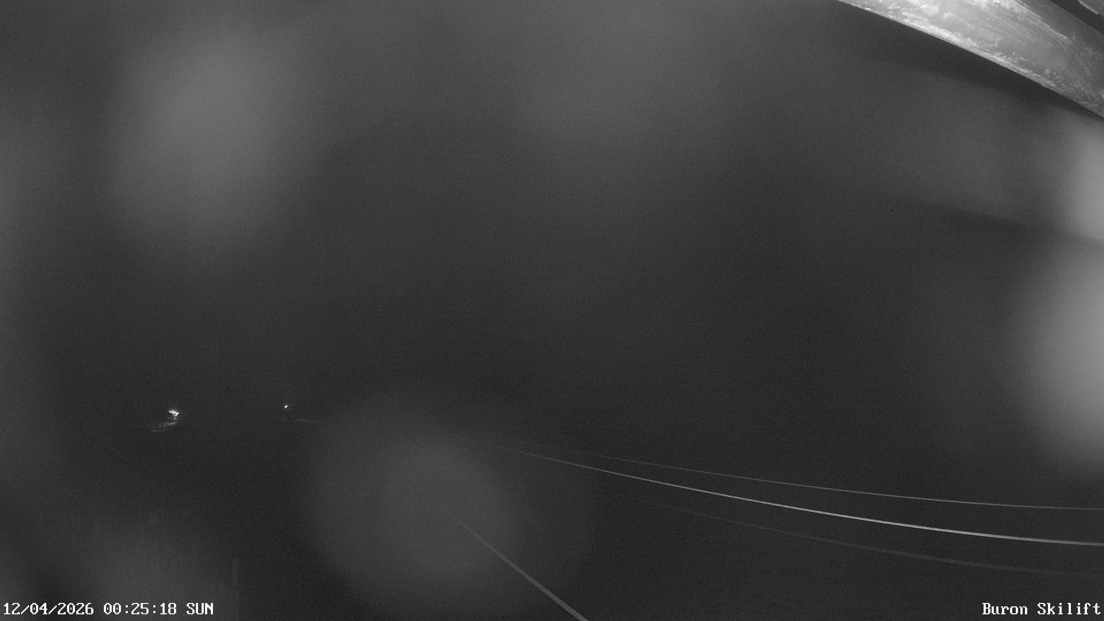 Archiv Foto Webcam Blick von der Talstation des Schlepplifts Buron auf den Lift und die Piste