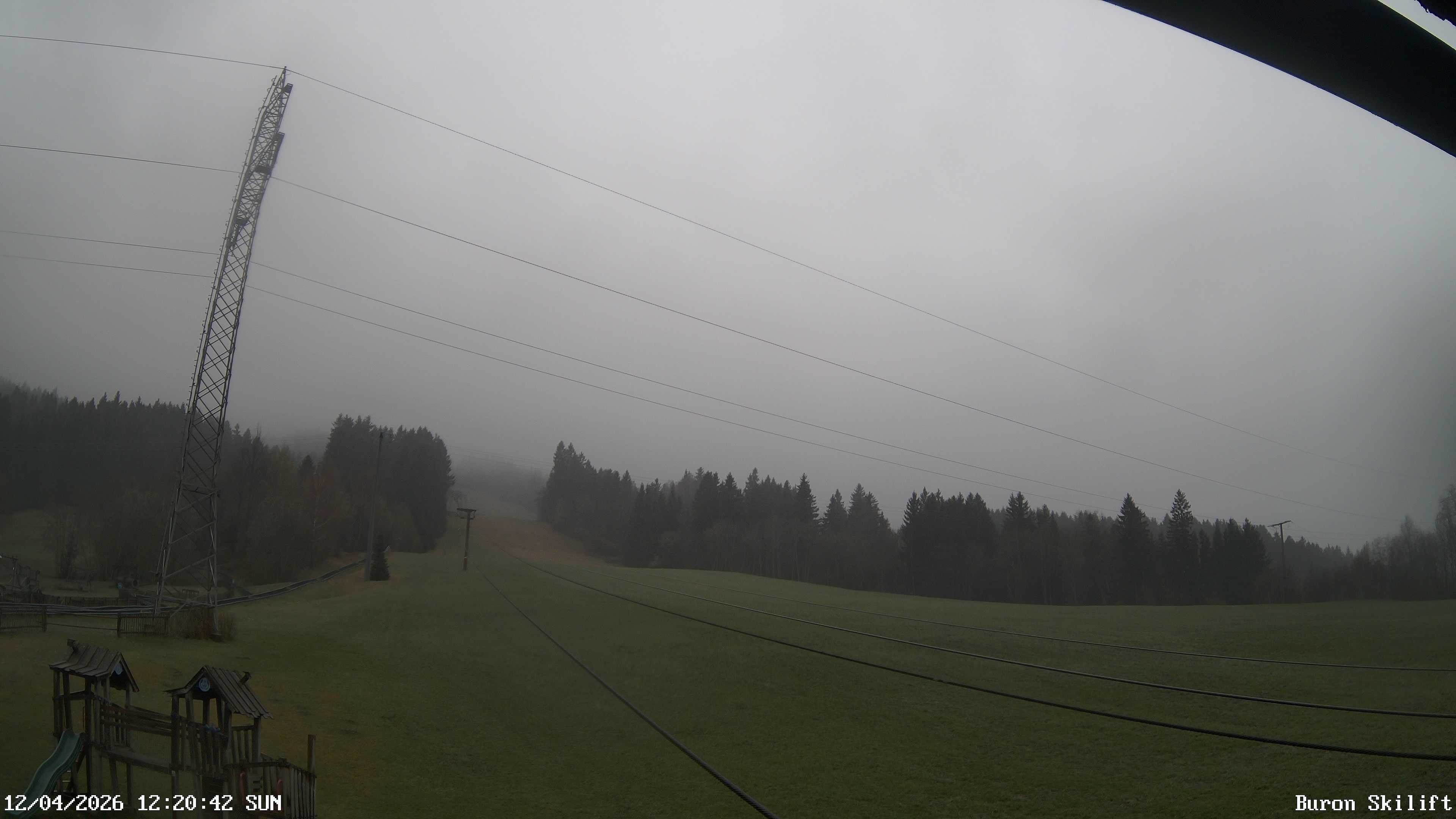 Archiv Foto Webcam Blick von der Talstation des Schlepplifts Buron auf den Lift und die Piste