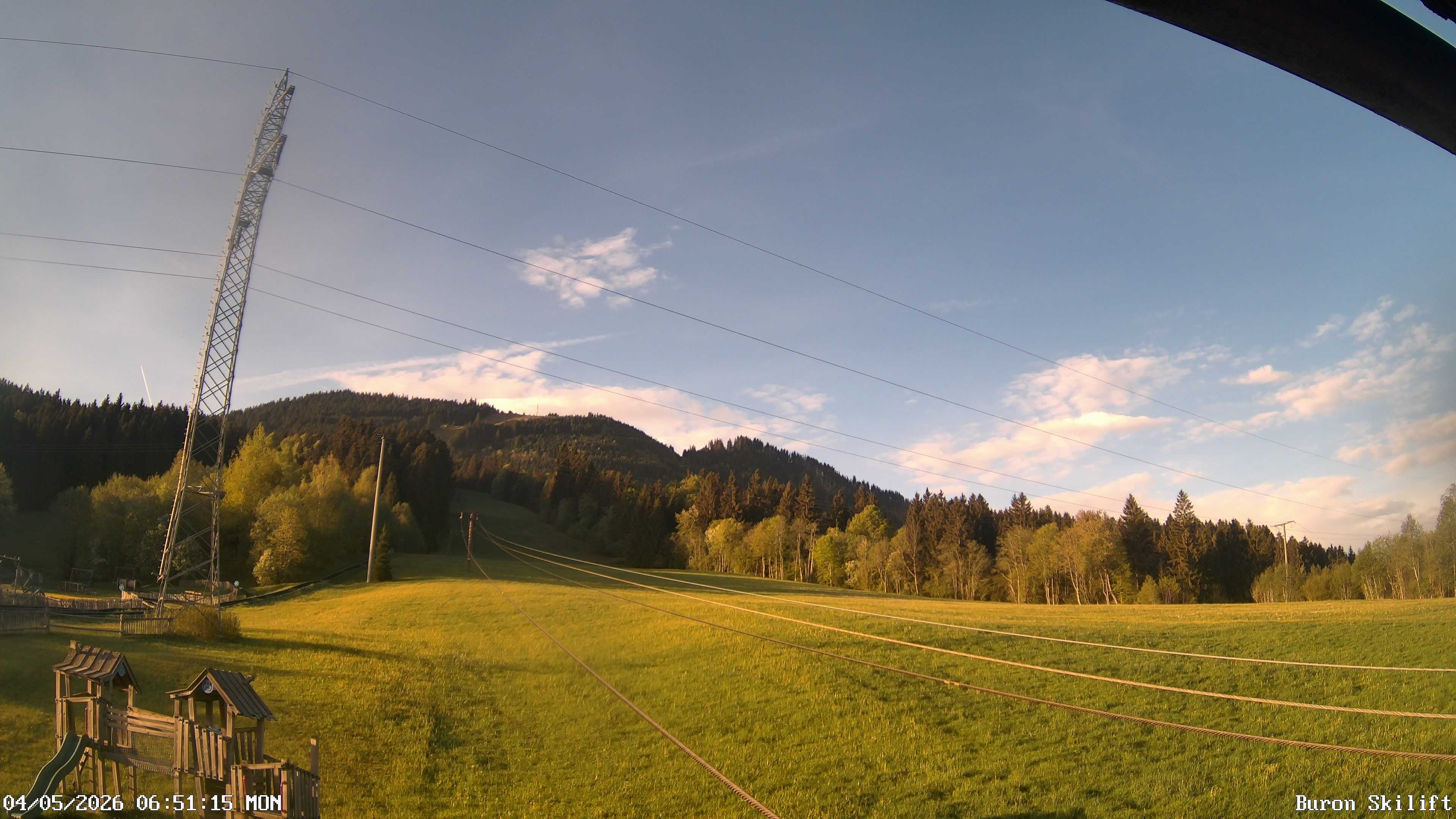 Archived image Webcam Enjoy the panoama view of the ski trail and lift in Buron