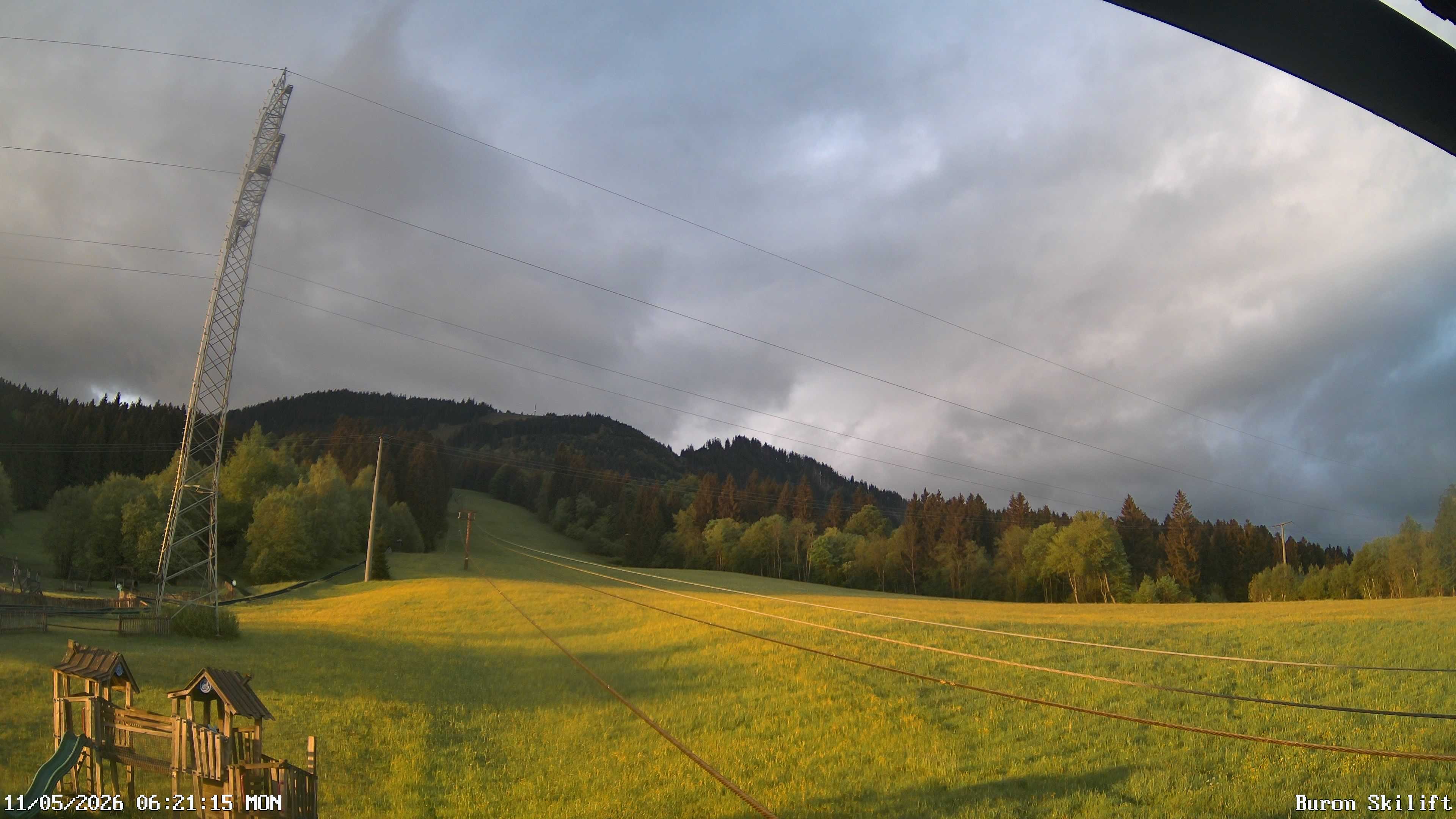 Archived image Webcam Enjoy the panoama view of the ski trail and lift in Buron