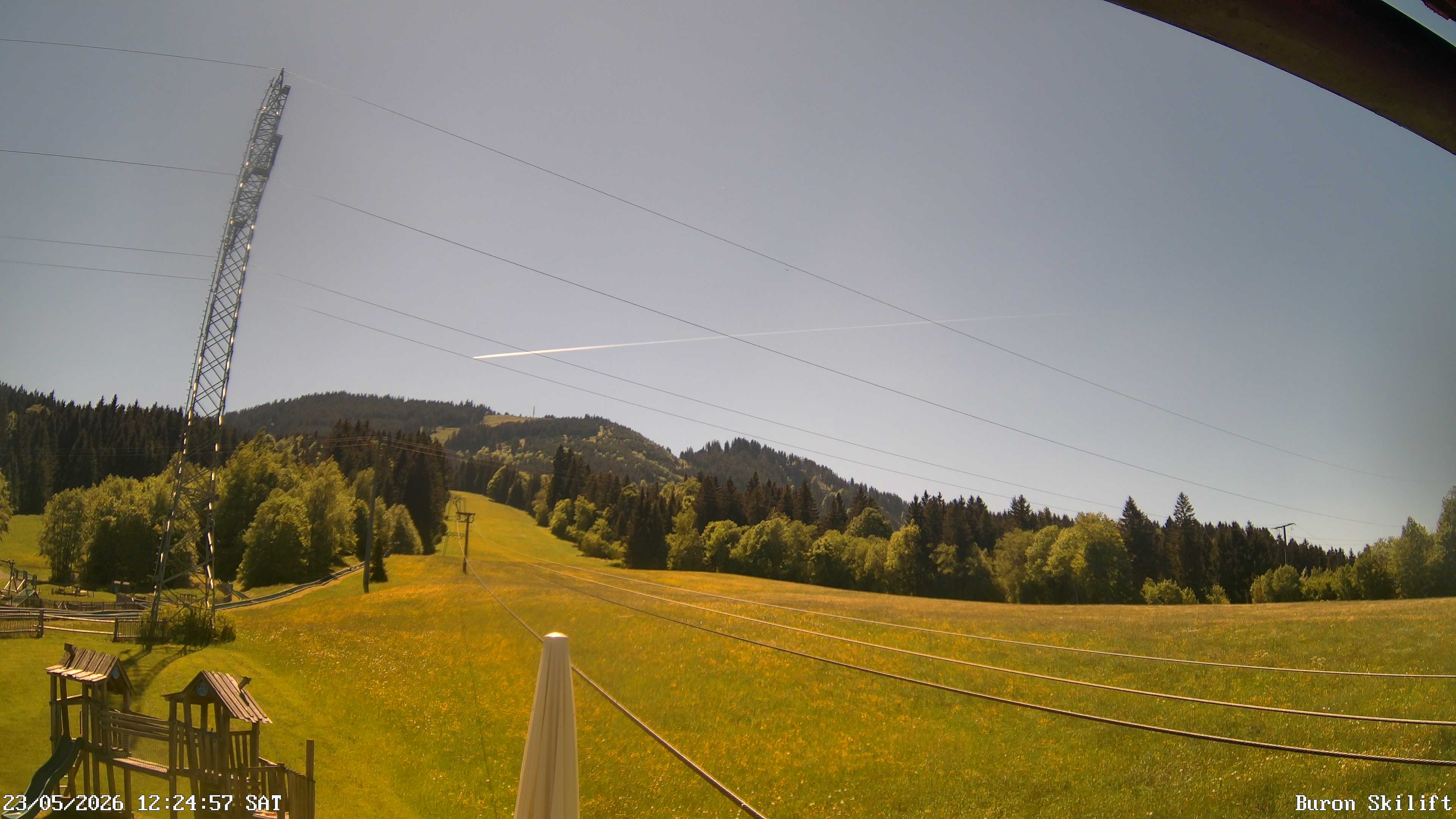 Archiv Foto Webcam Blick von der Talstation des Schlepplifts Buron auf den Lift und die Piste