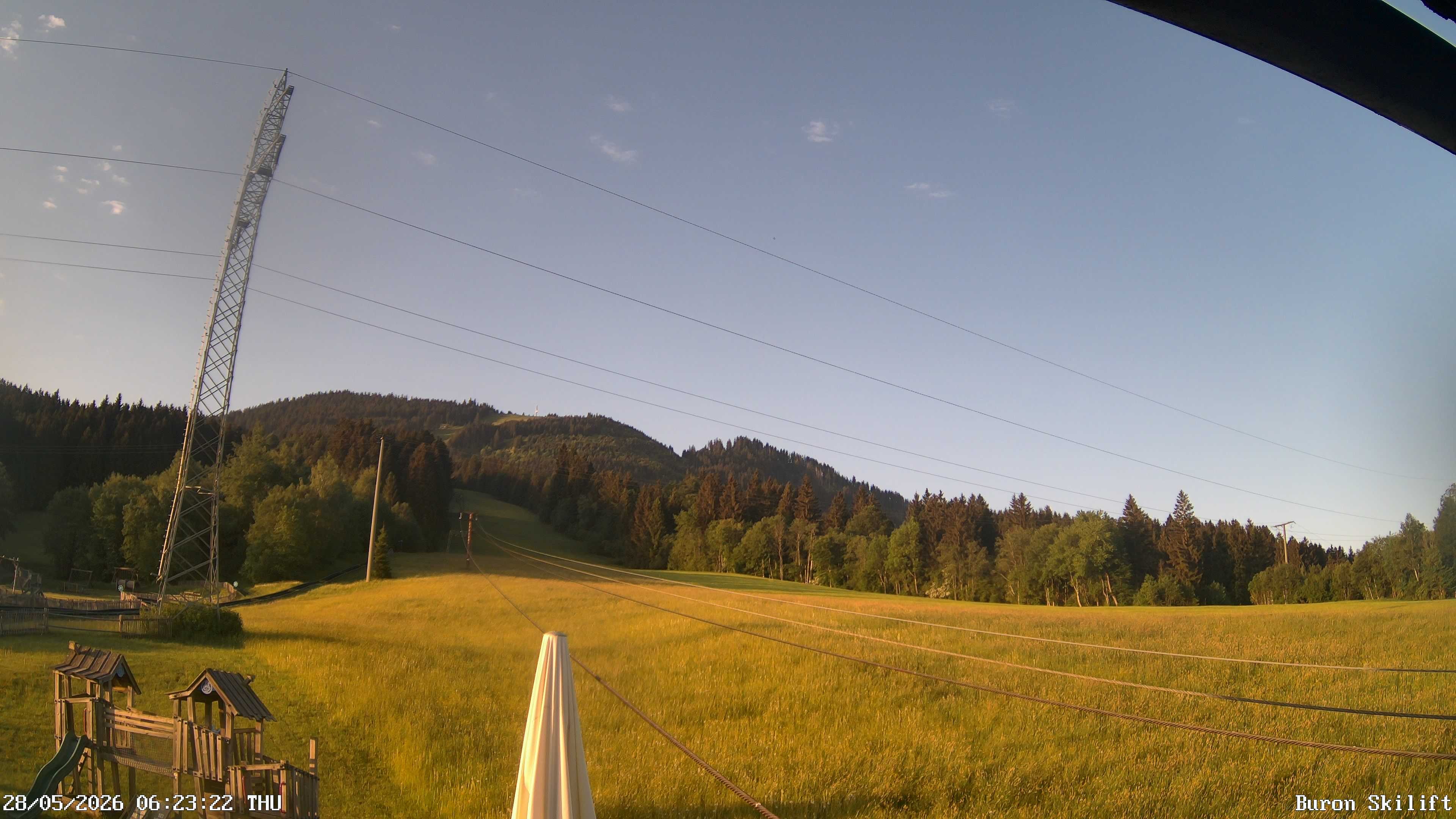 Archived image Webcam Enjoy the panoama view of the ski trail and lift in Buron