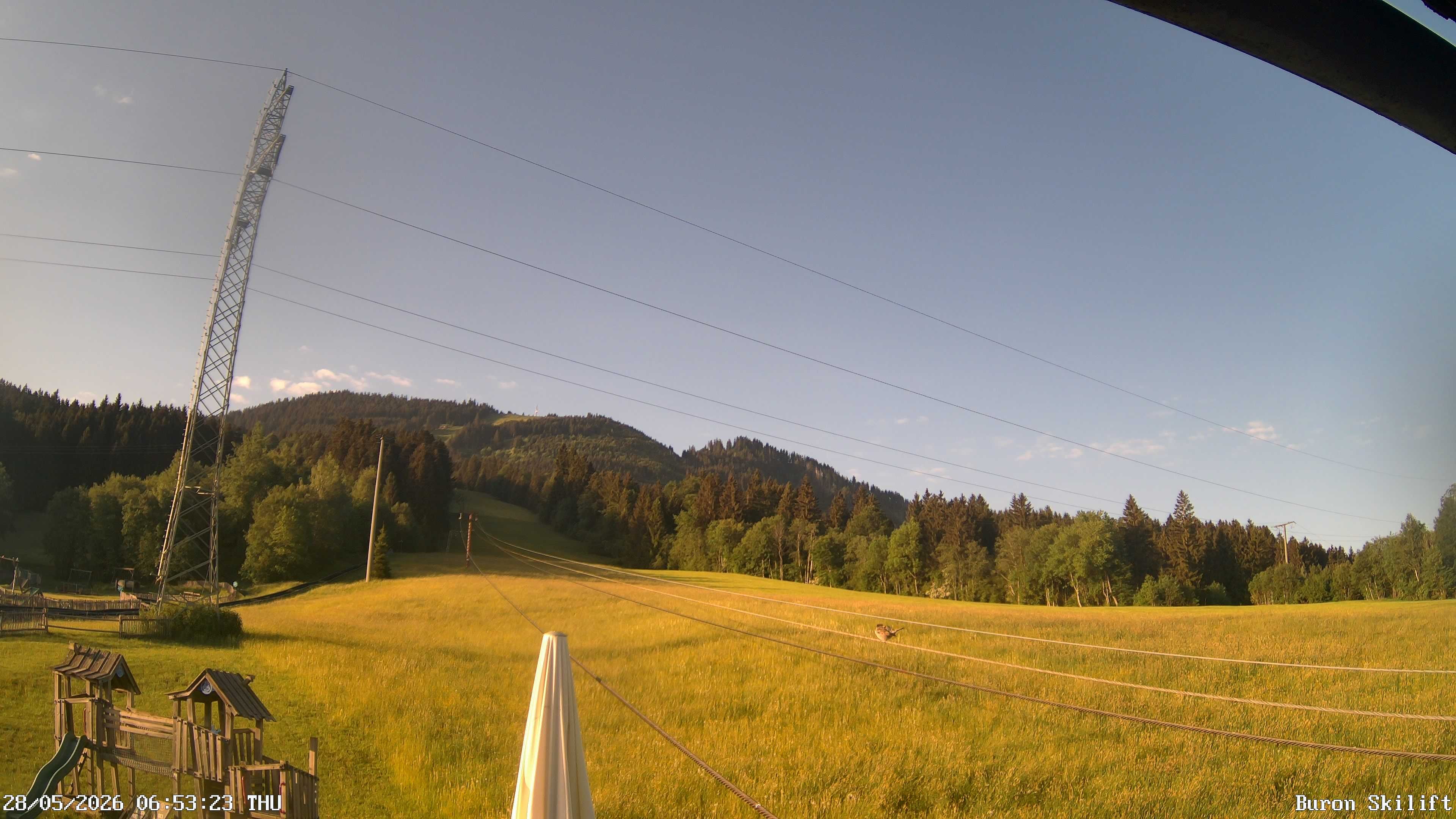 Archived image Webcam Enjoy the panoama view of the ski trail and lift in Buron