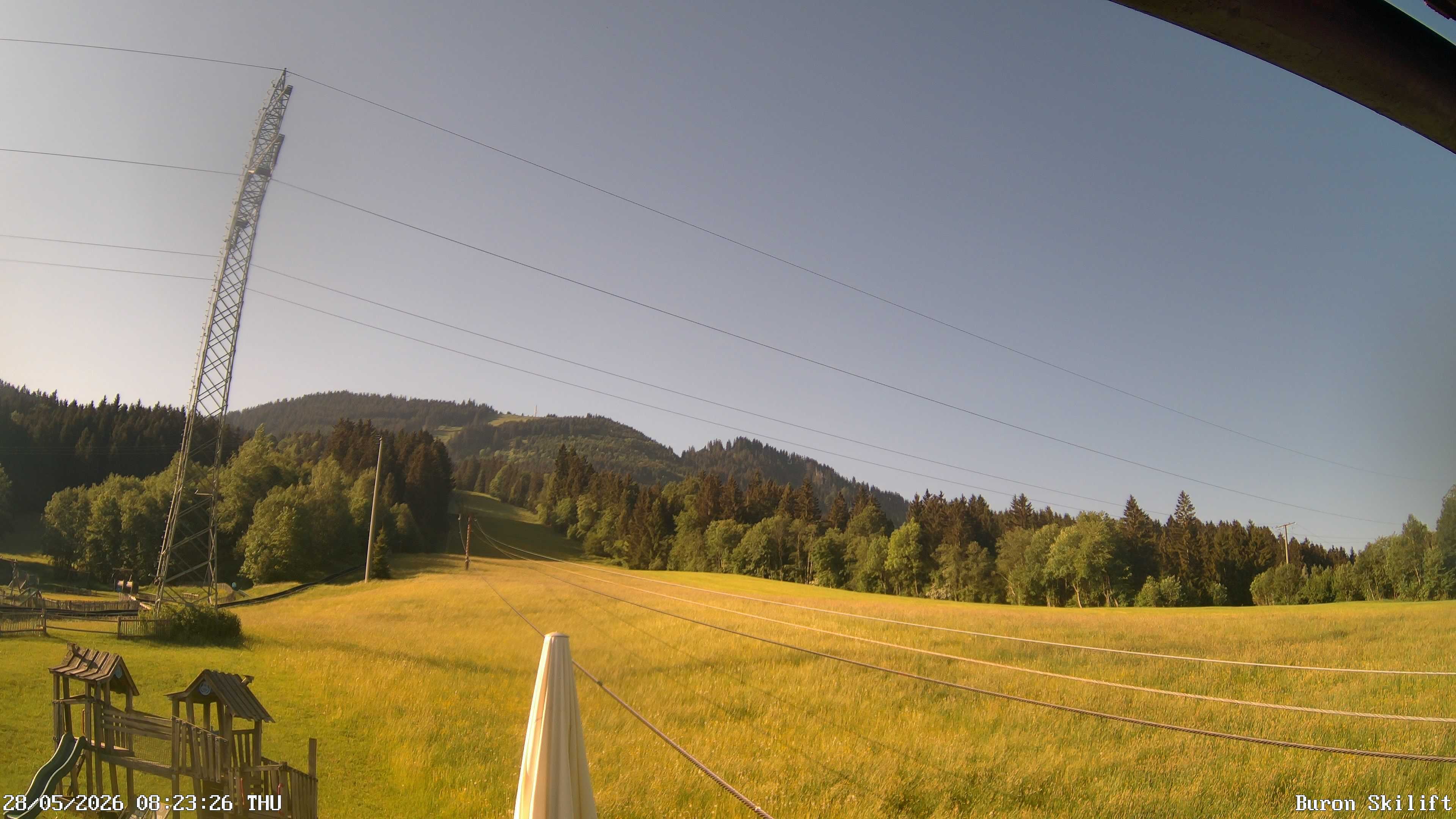 Archived image Webcam Enjoy the panoama view of the ski trail and lift in Buron