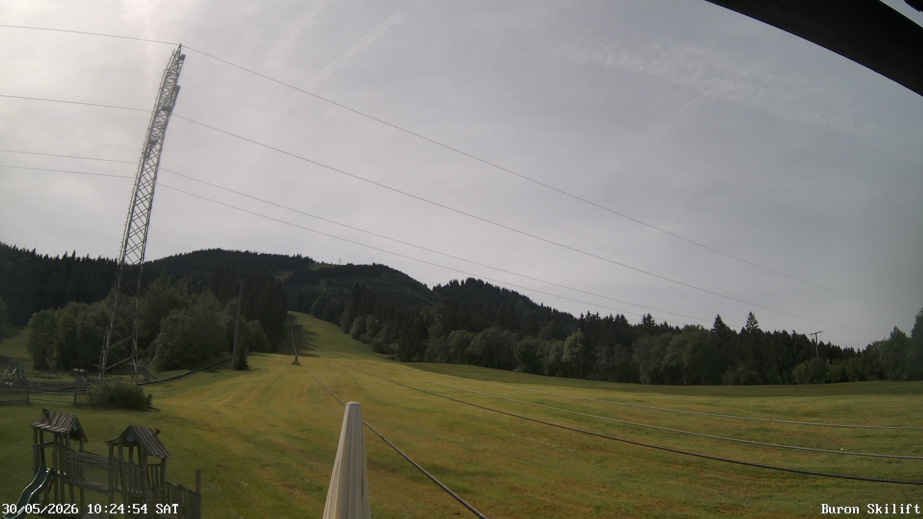 Archiv Foto Webcam Blick von der Talstation des Schlepplifts Buron auf den Lift und die Piste