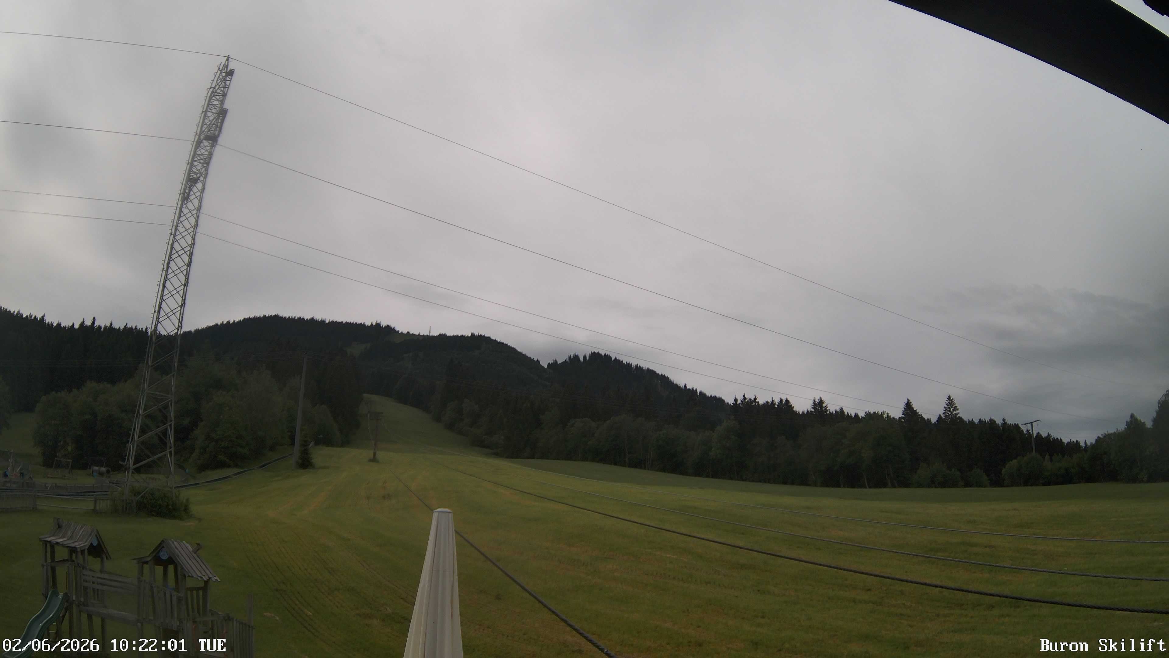 Archiv Foto Webcam Blick von der Talstation des Schlepplifts Buron auf den Lift und die Piste