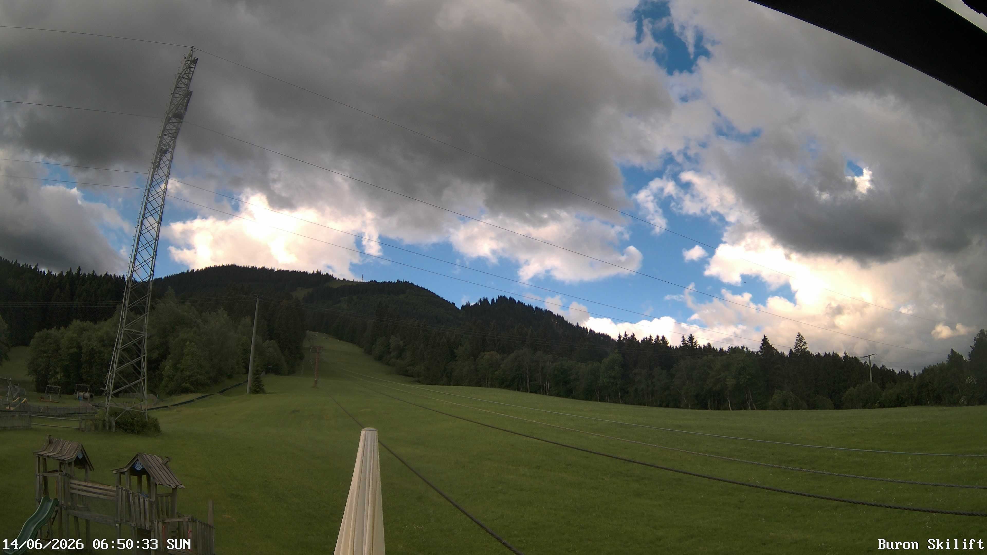 Archived image Webcam Enjoy the panoama view of the ski trail and lift in Buron