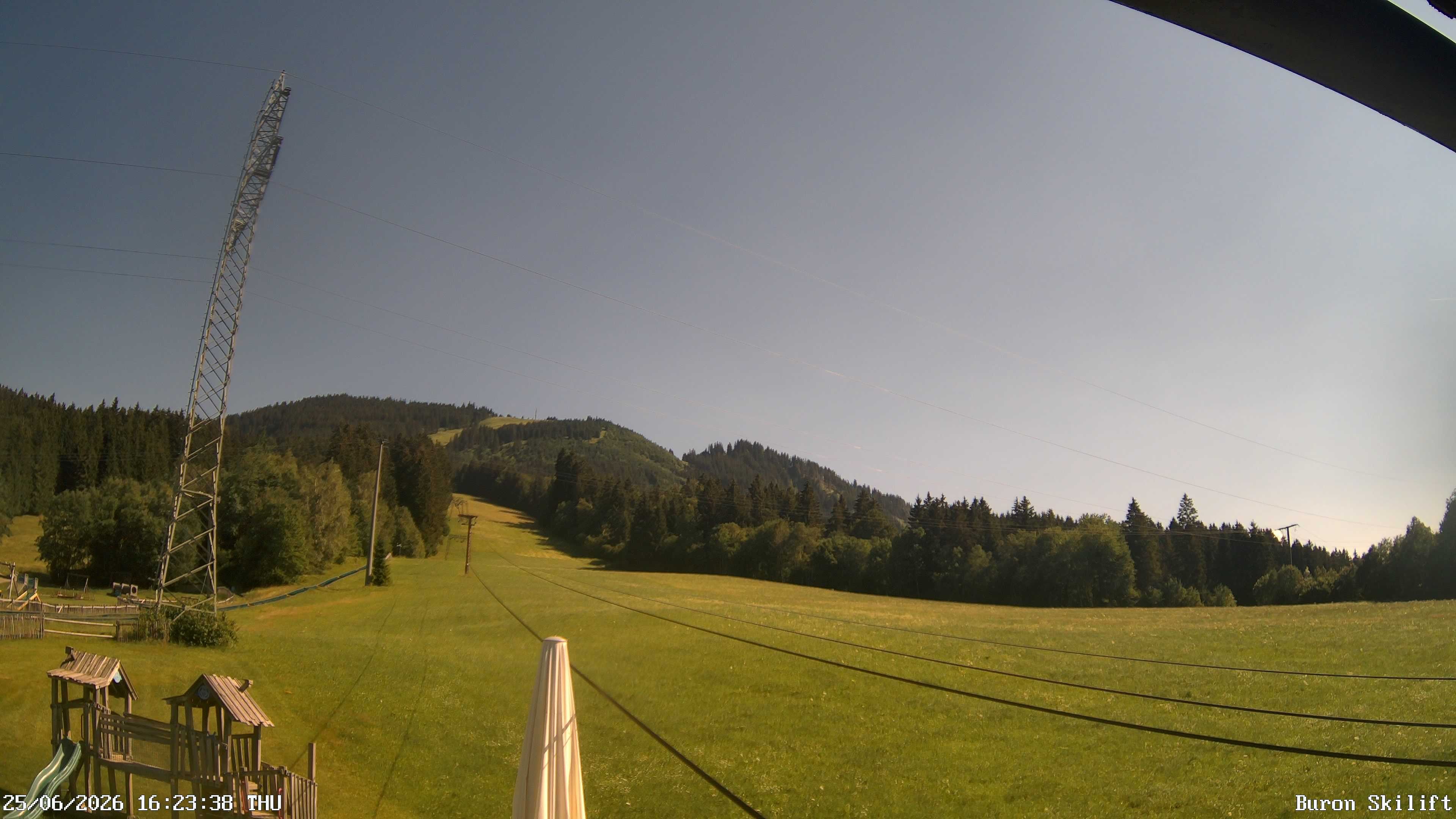 Archived image Webcam Enjoy the panoama view of the ski trail and lift in Buron