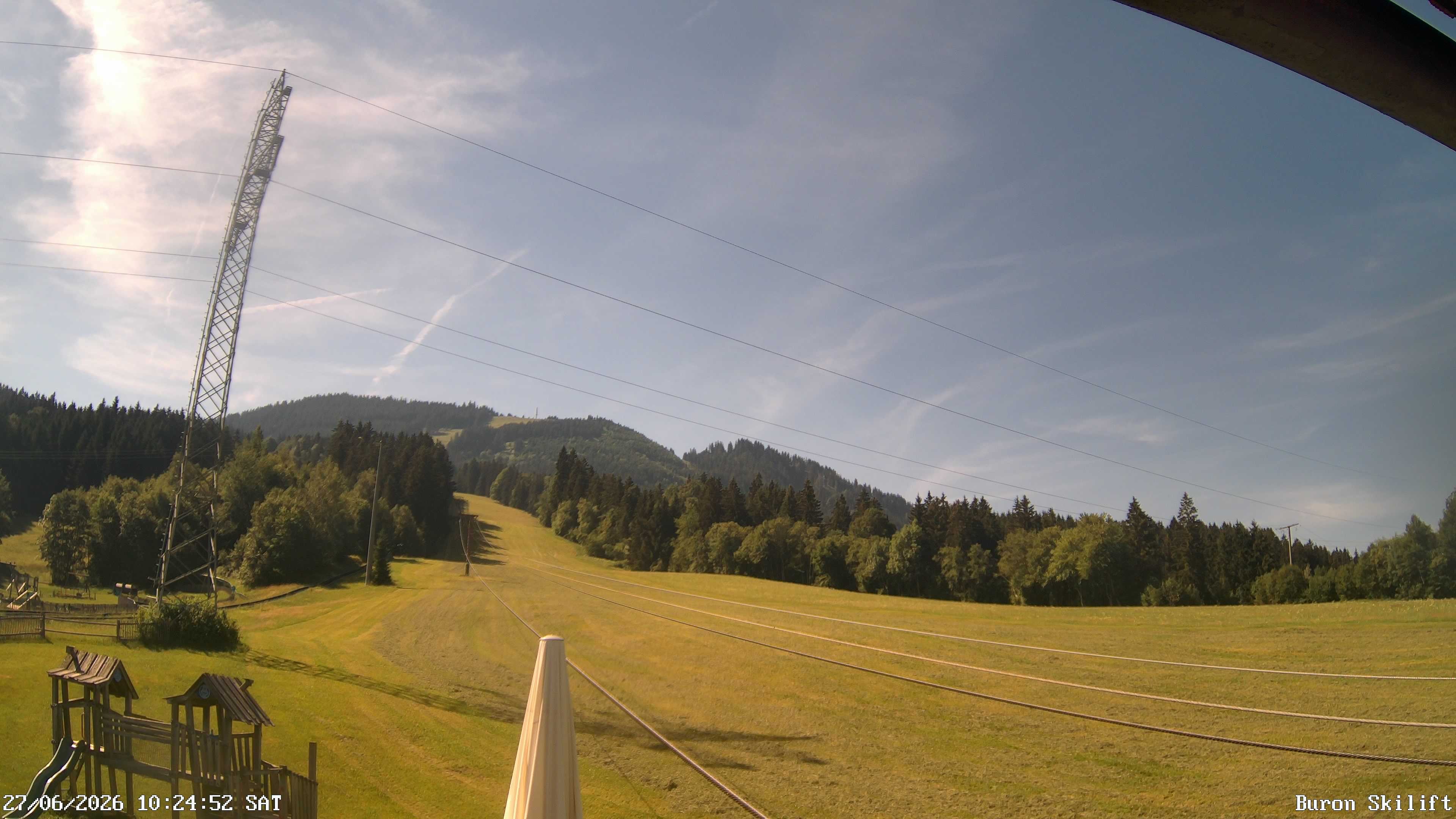 Archived image Webcam Enjoy the panoama view of the ski trail and lift in Buron