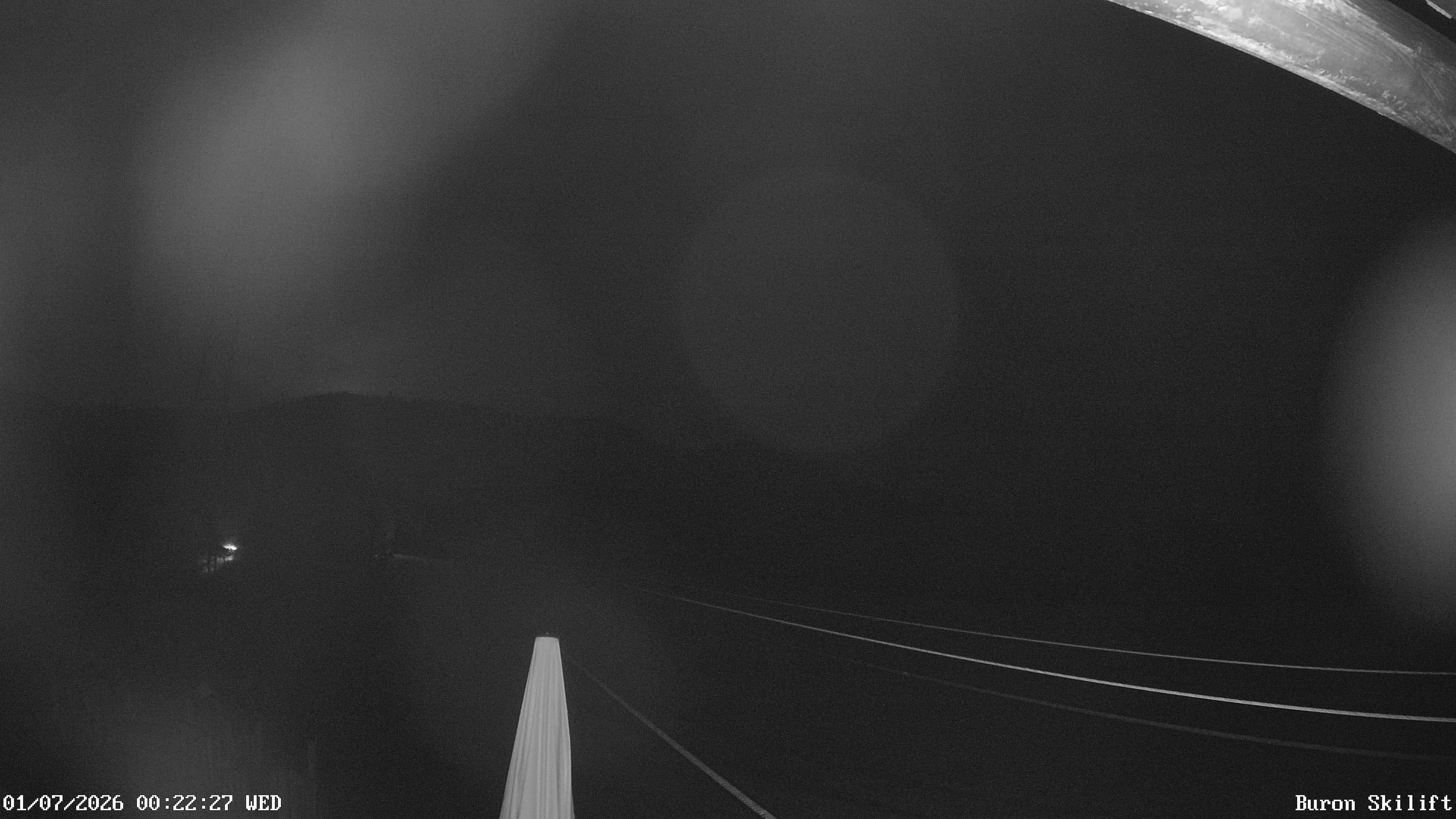 Archiv Foto Webcam Blick von der Talstation des Schlepplifts Buron auf den Lift und die Piste