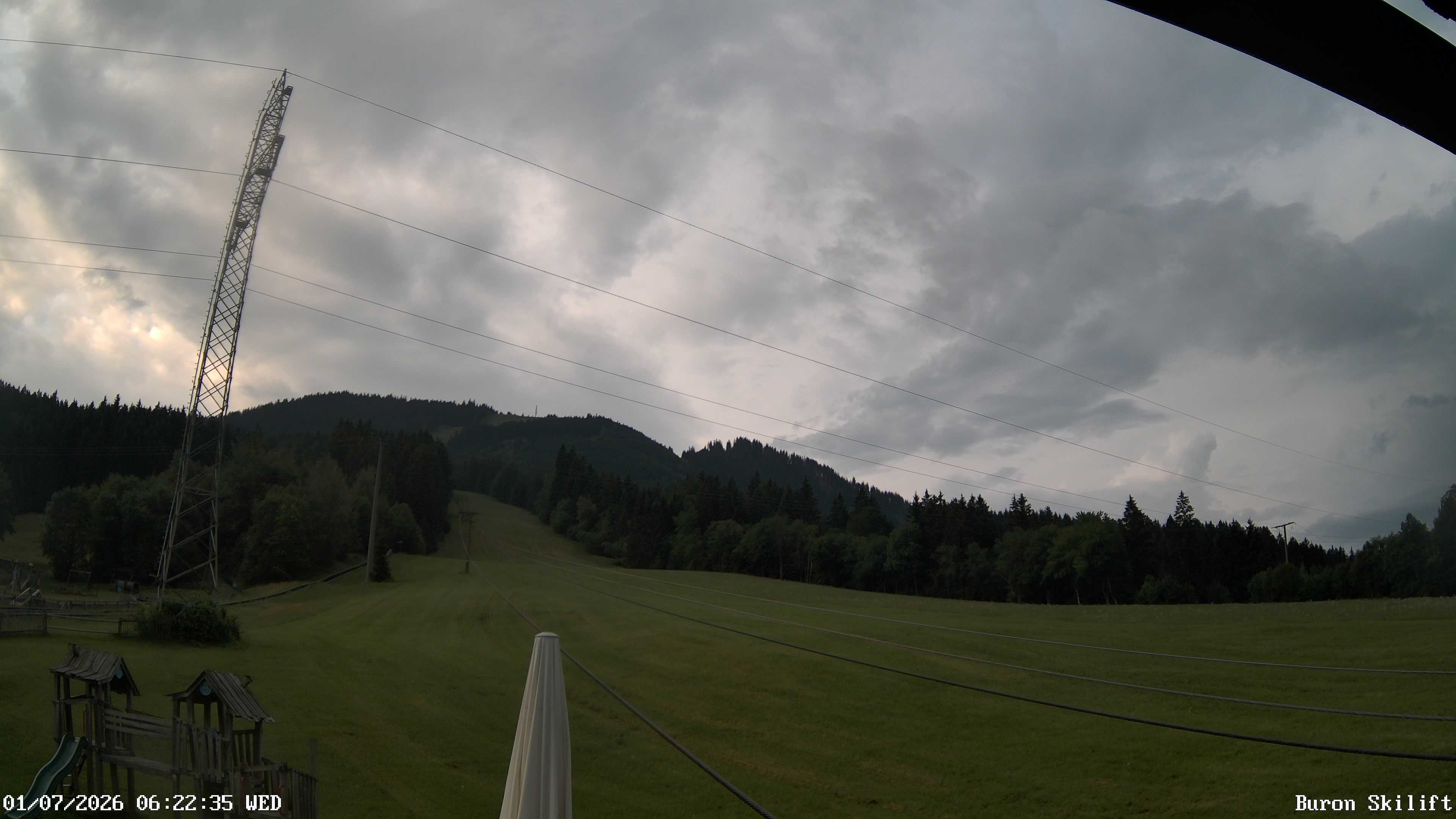 Archived image Webcam Enjoy the panoama view of the ski trail and lift in Buron