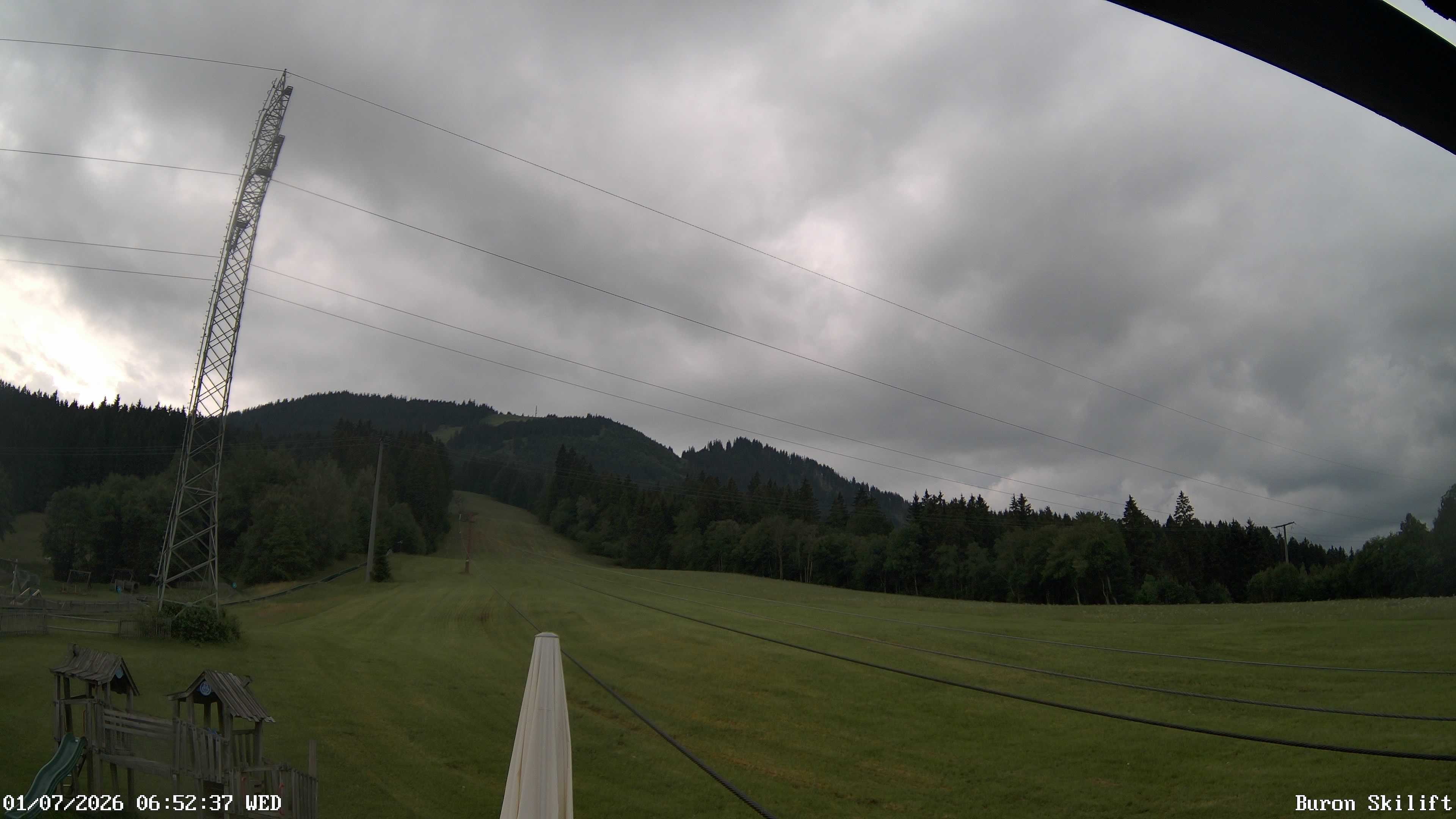 Archived image Webcam Enjoy the panoama view of the ski trail and lift in Buron
