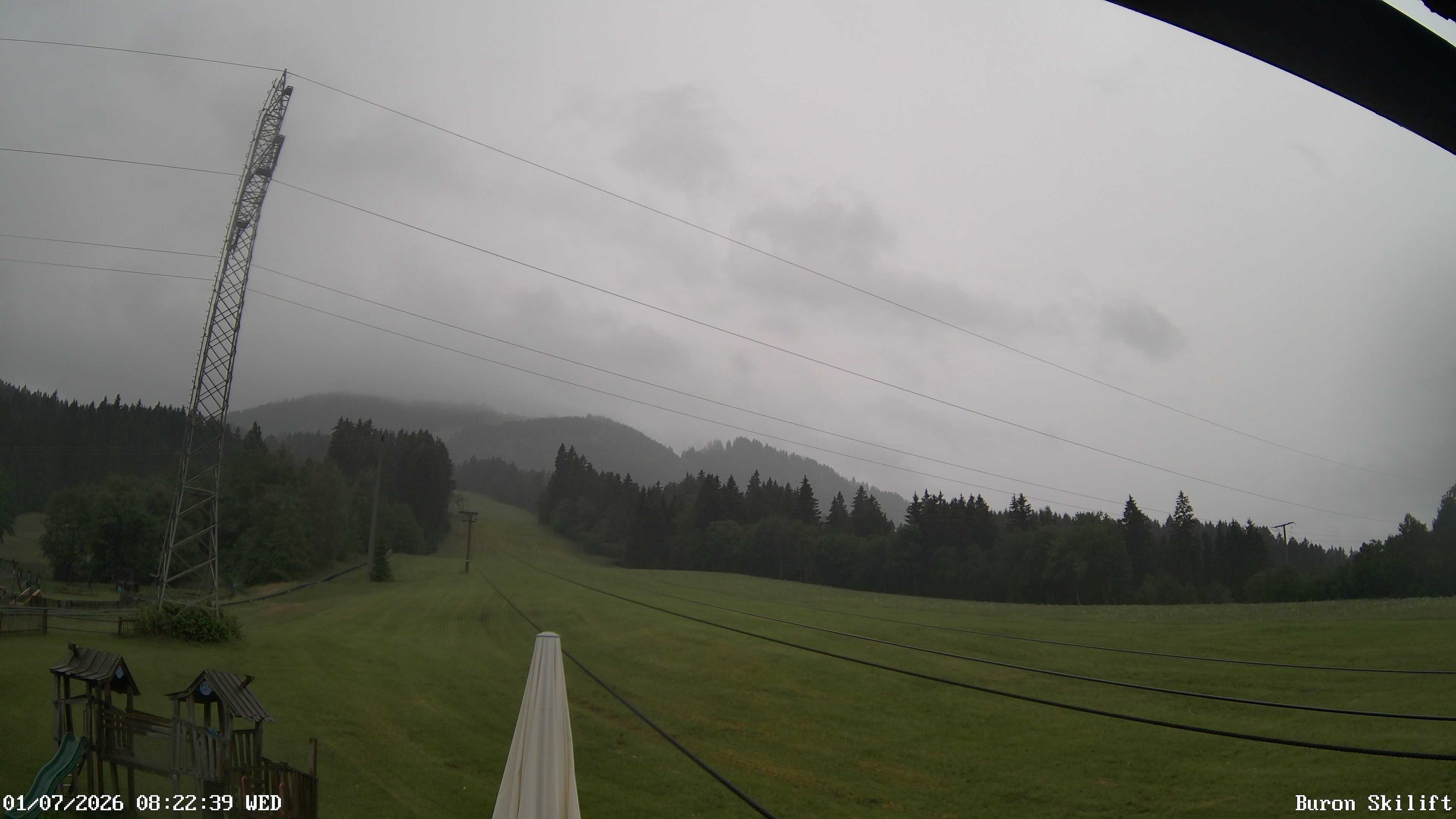 Archived image Webcam Enjoy the panoama view of the ski trail and lift in Buron