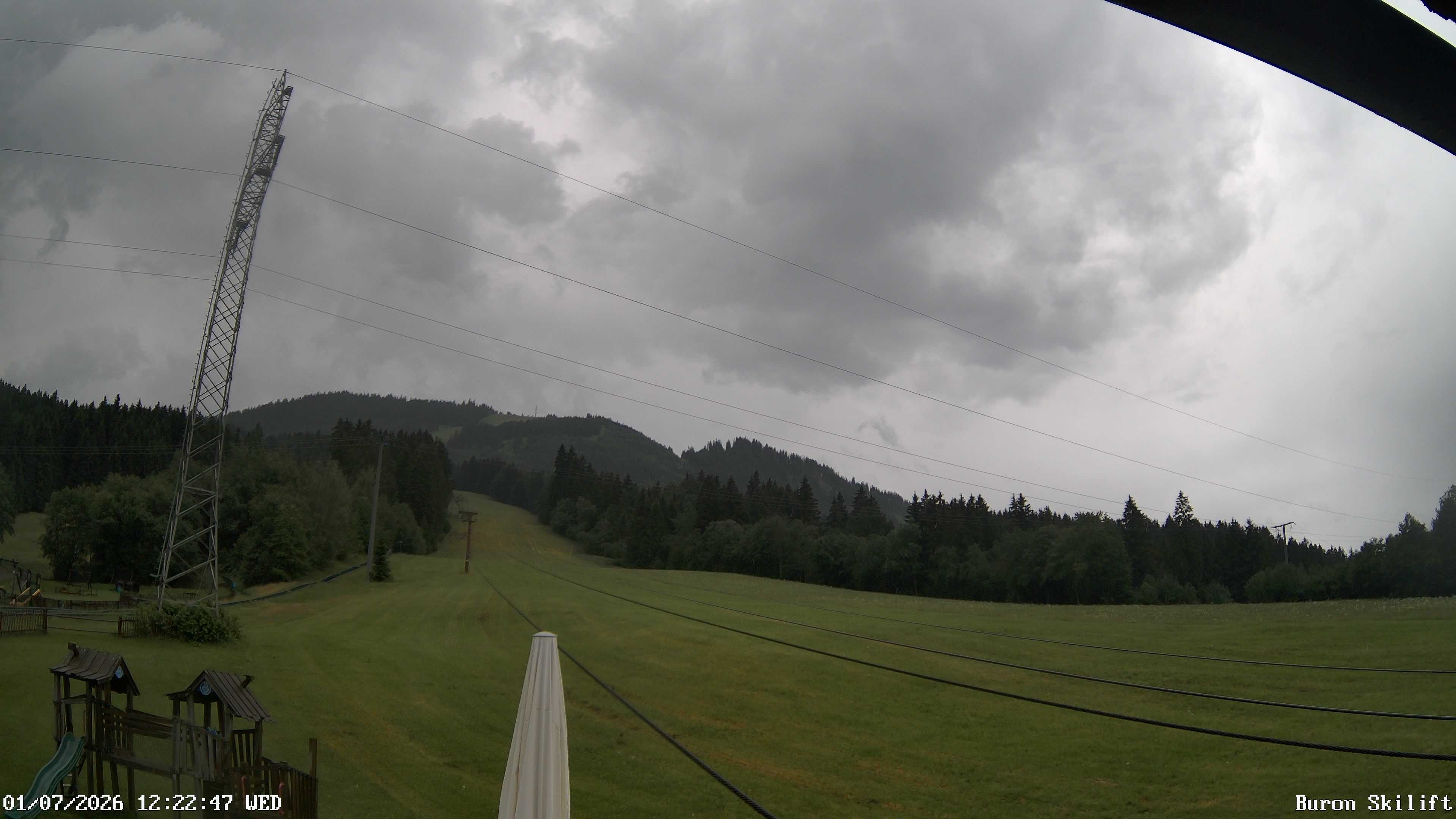 Archived image Webcam Enjoy the panoama view of the ski trail and lift in Buron