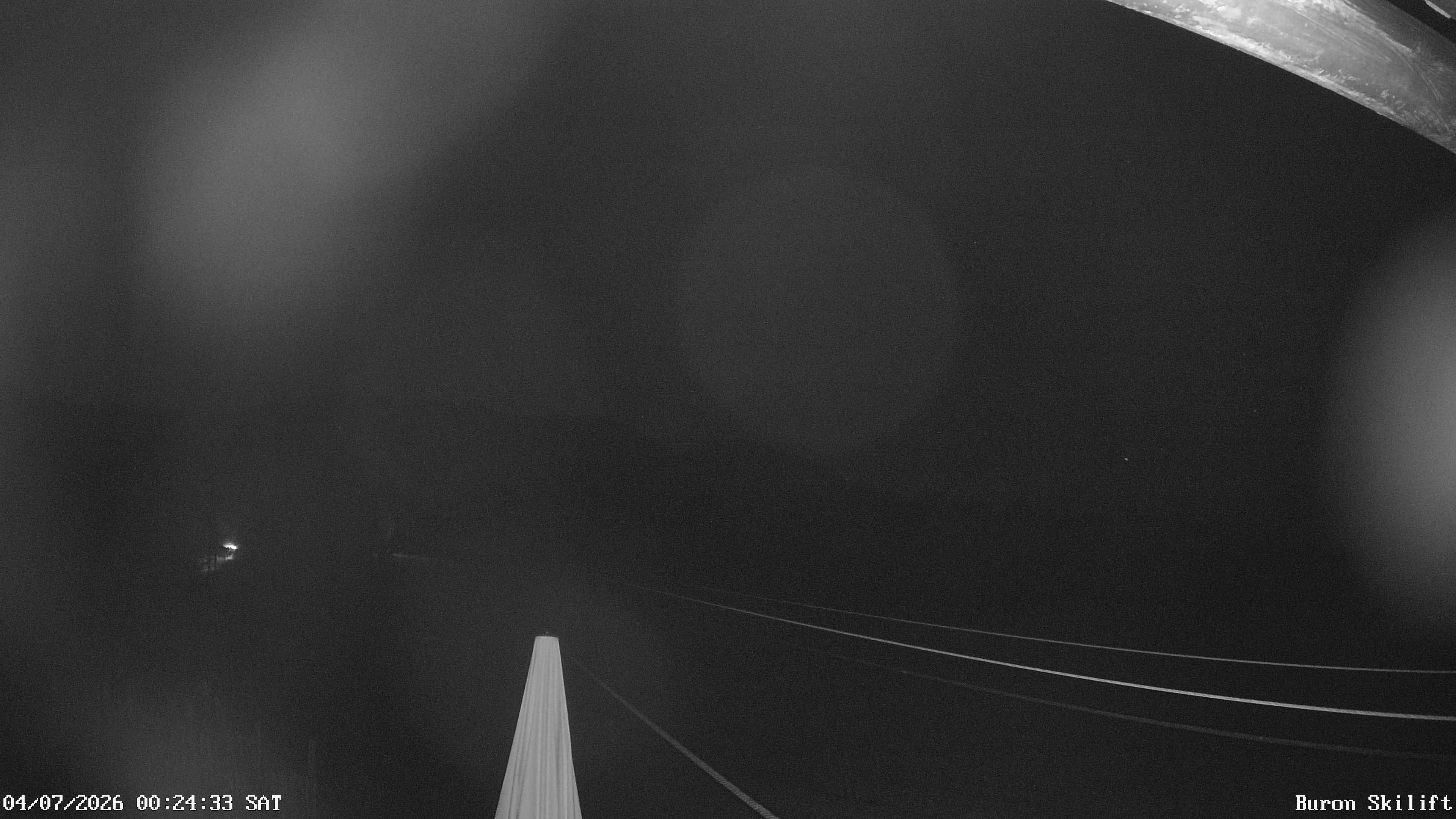 Archiv Foto Webcam Blick von der Talstation des Schlepplifts Buron auf den Lift und die Piste
