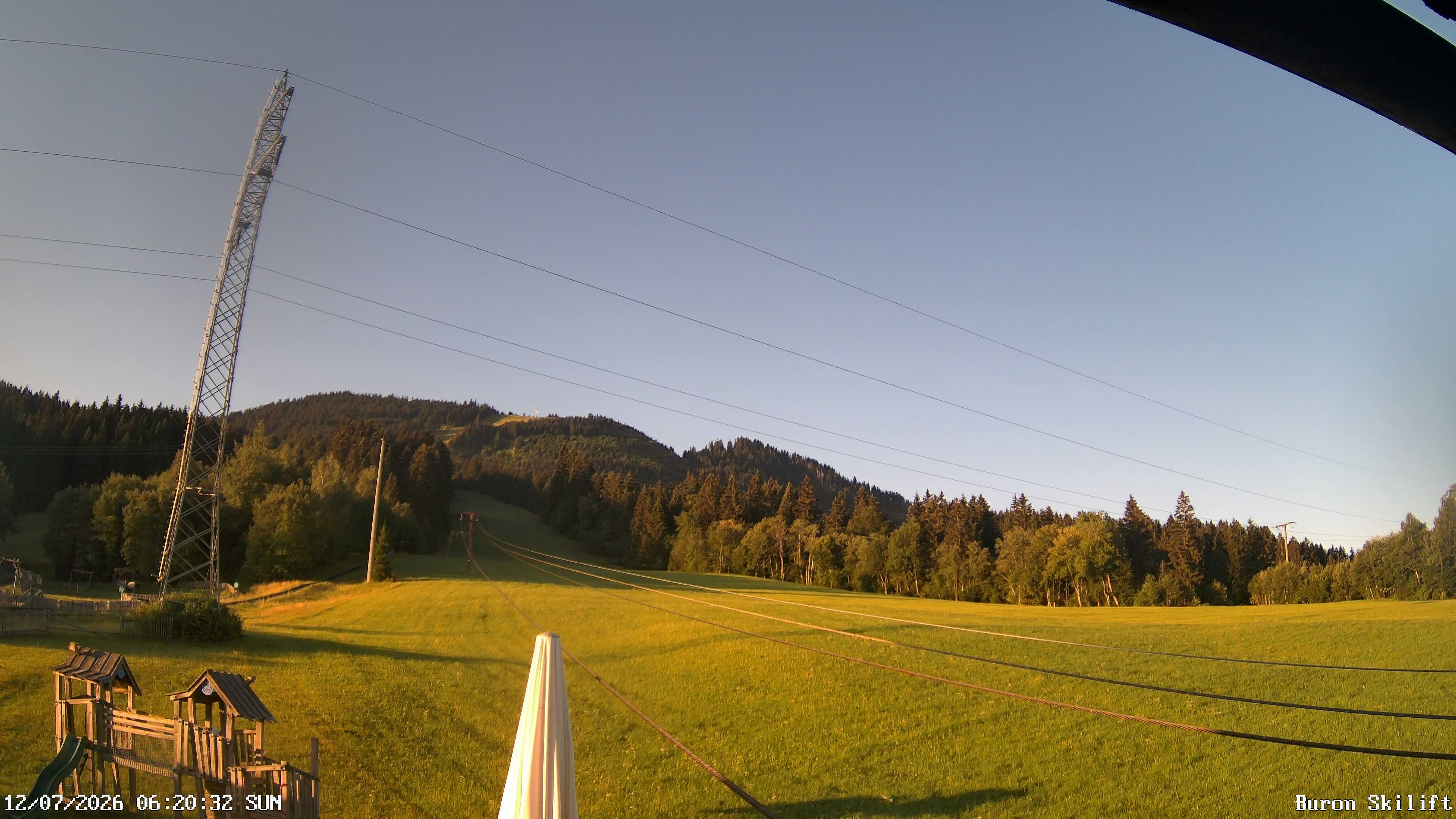 Archived image Webcam Enjoy the panoama view of the ski trail and lift in Buron