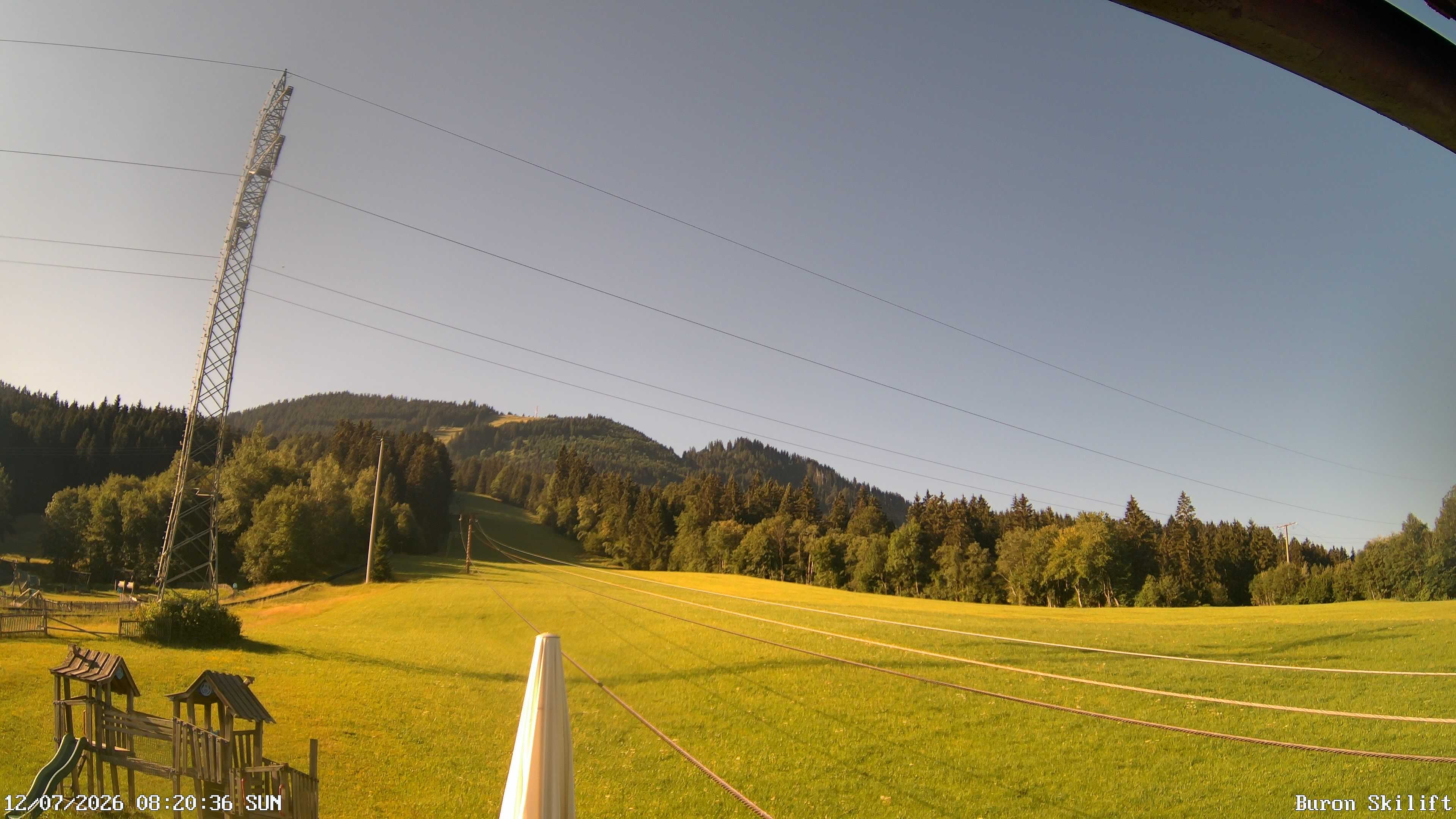 Archived image Webcam Enjoy the panoama view of the ski trail and lift in Buron